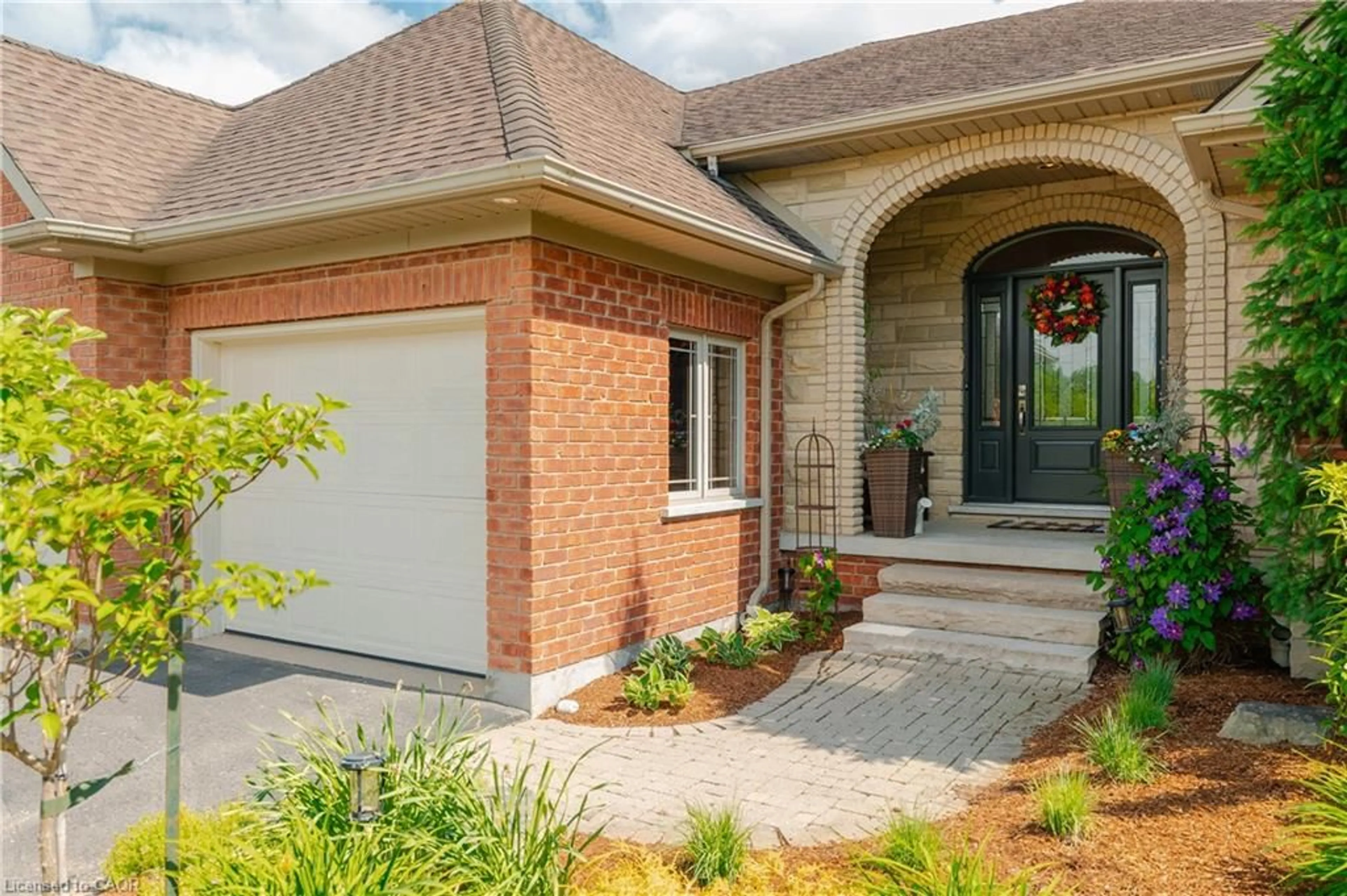Home with brick exterior material, street for 333 Deer Ridge Dr, Kitchener Ontario N2P 2K6