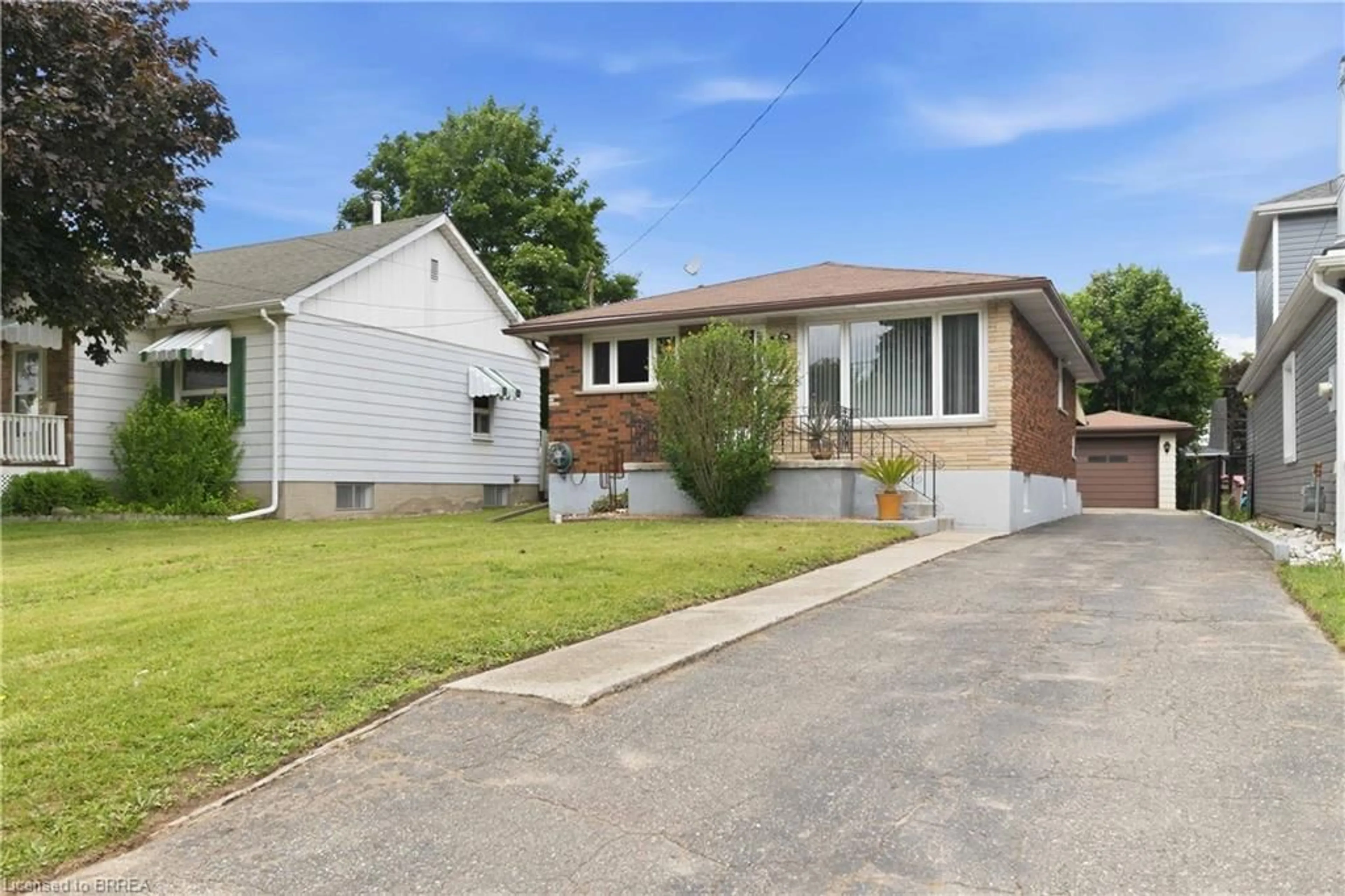Home with brick exterior material, street for 398 Sheridan St, Brantford Ontario N3S 4S4