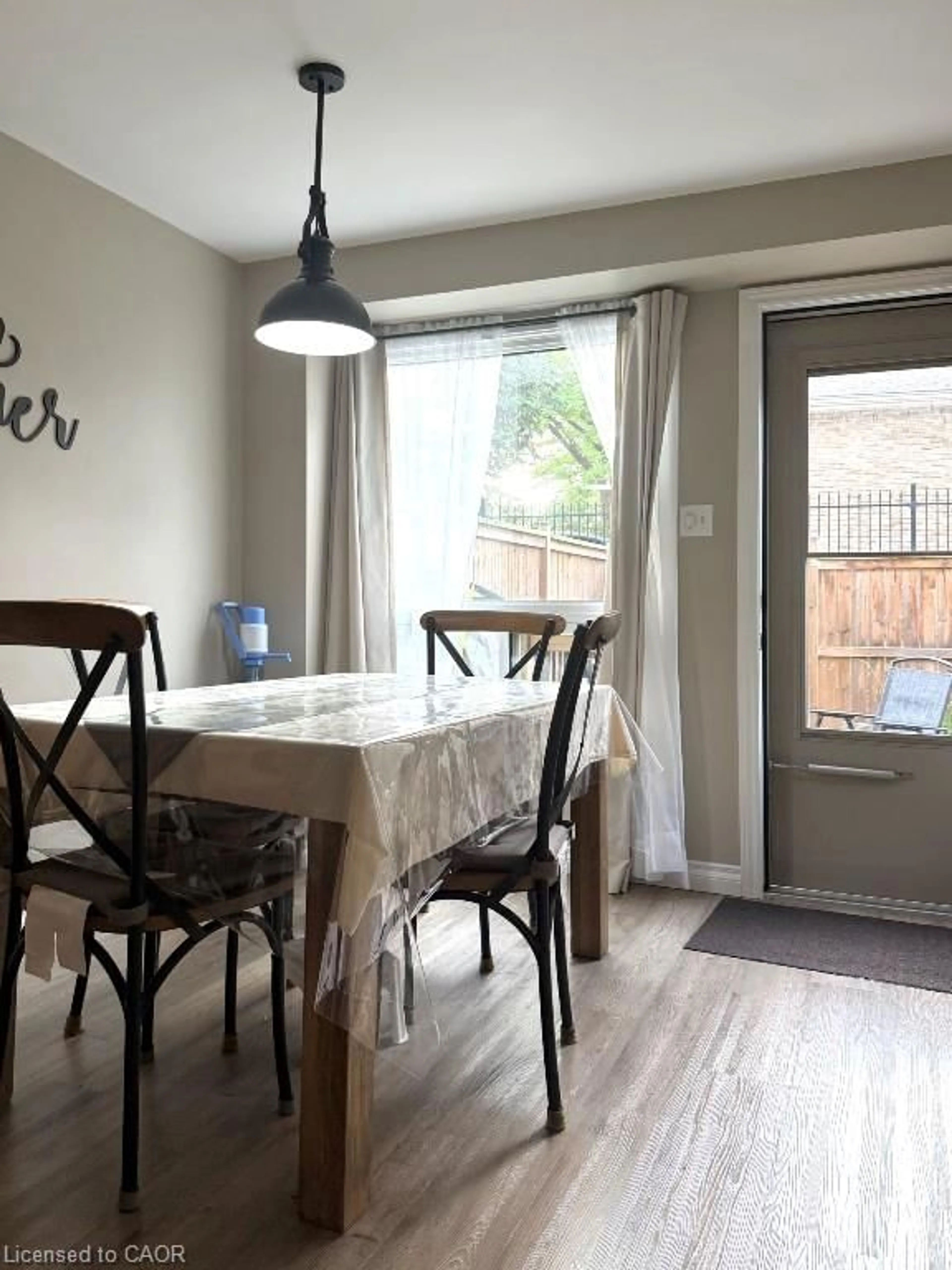 Dining room, wood/laminate floor for 223 Pioneer Dr #B16, Kitchener Ontario N2P 1L9