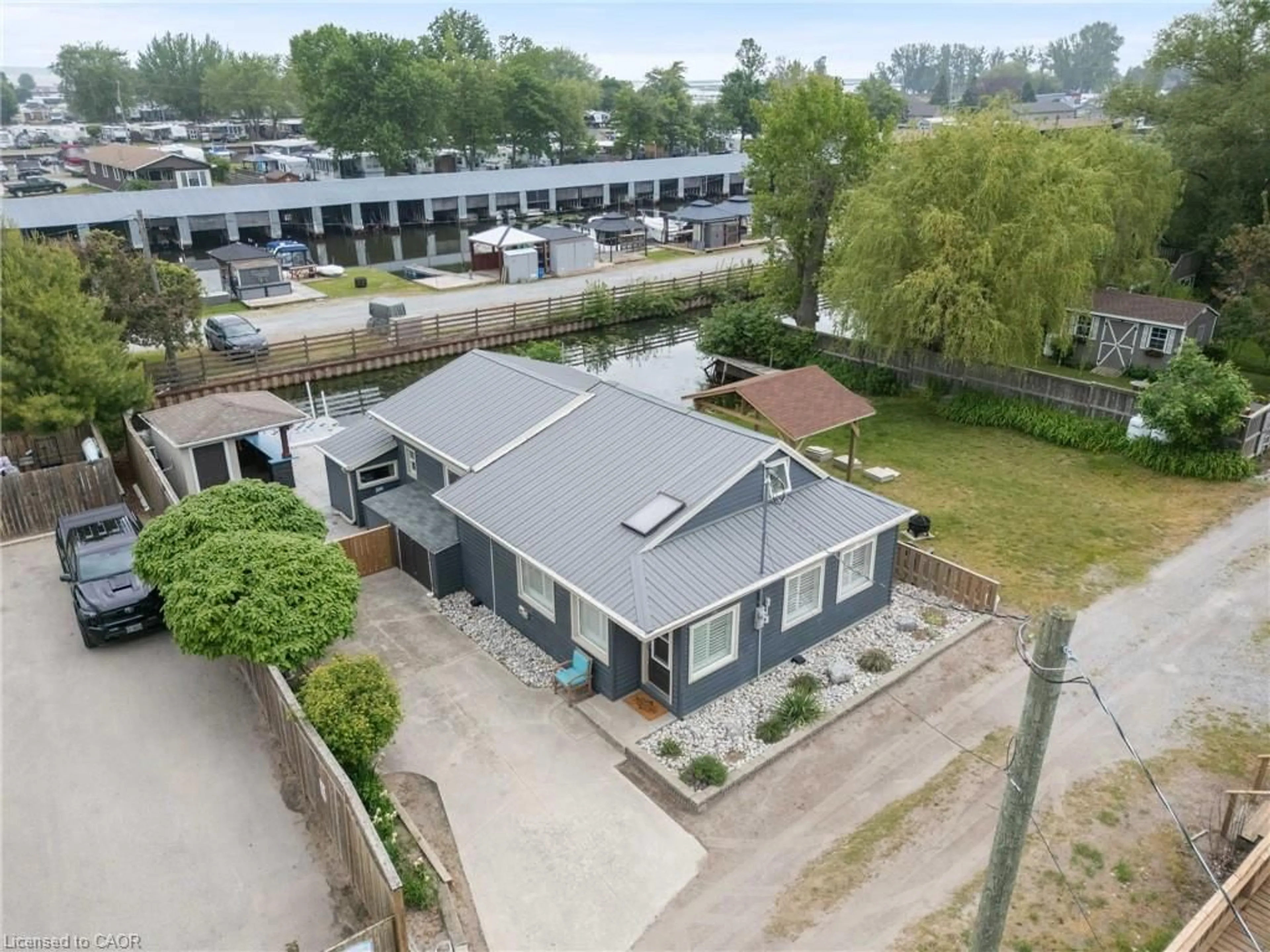 A pic from outside/outdoor area/front of a property/back of a property/a pic from drone, building for 24 Private Lane, Long Point Ontario N0E 1M0