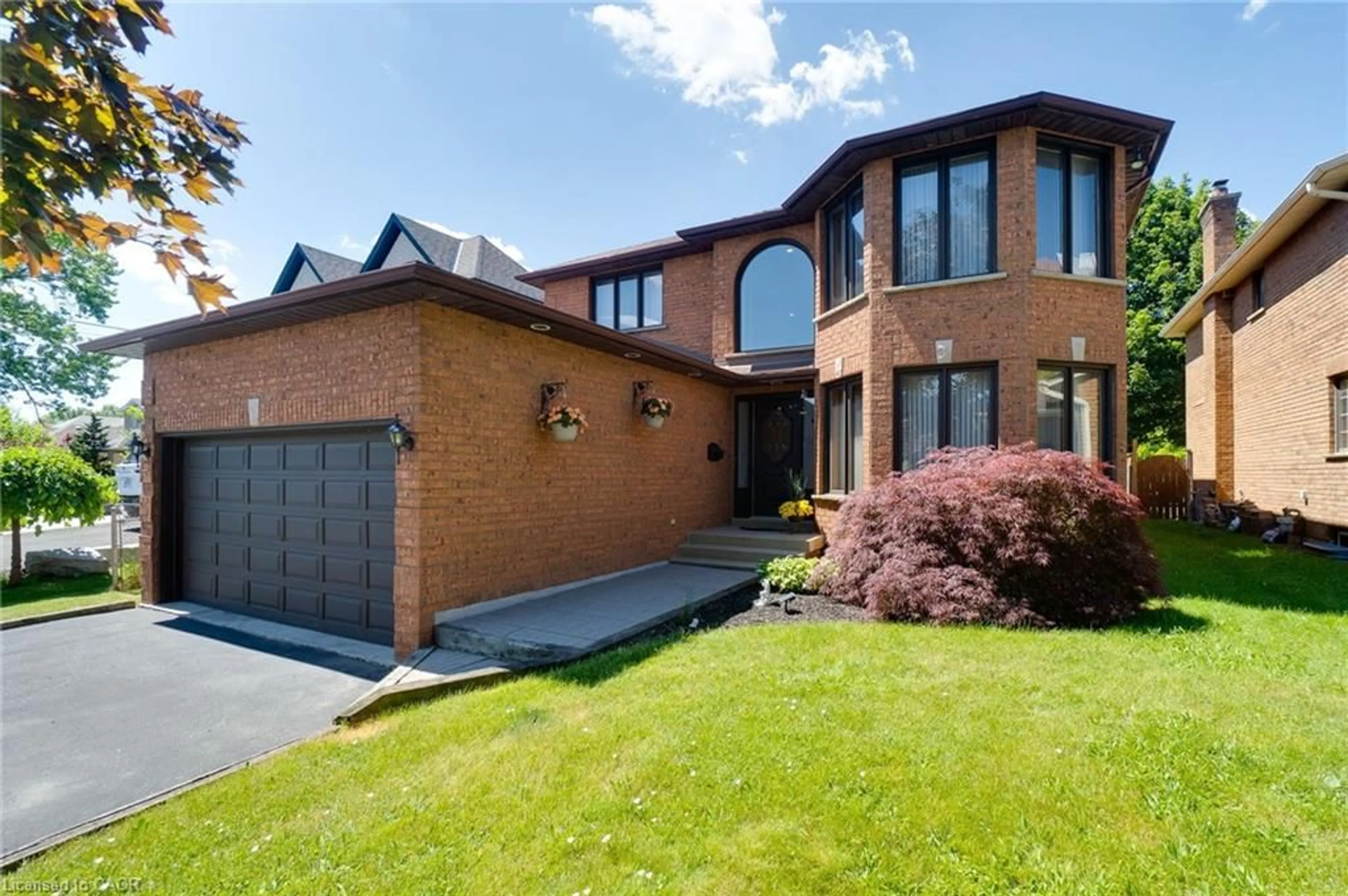 Home with brick exterior material, street for 2560 Rugby Rd, Mississauga Ontario L5B 1T2