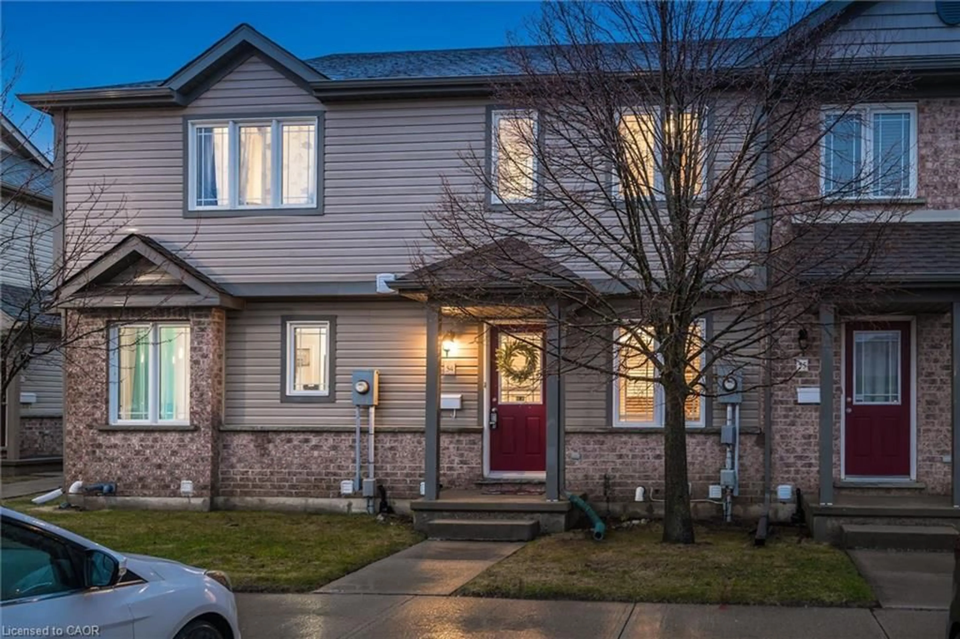 Home with vinyl exterior material, street for 535 Windflower Cres #54, Kitchener Ontario N2E 4L7