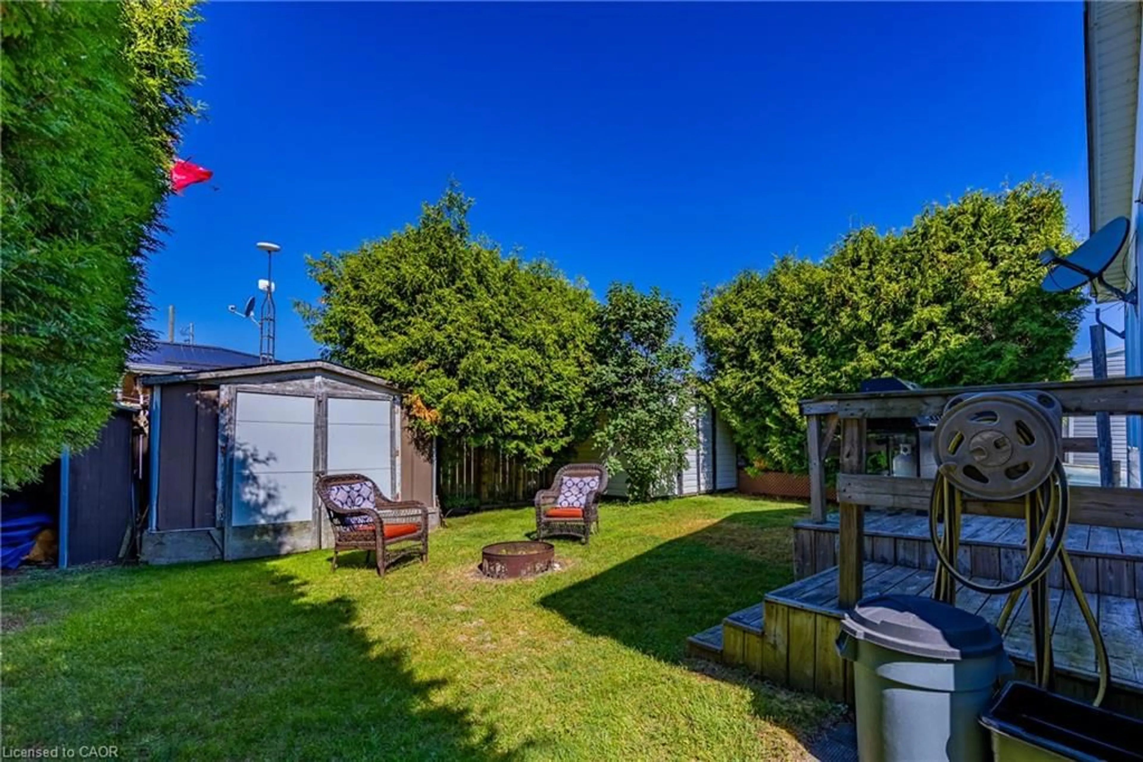 A pic from outside/outdoor area/front of a property/back of a property/a pic from drone, street for 22 Bass Lane, Port Rowan Ontario N0E 1M0