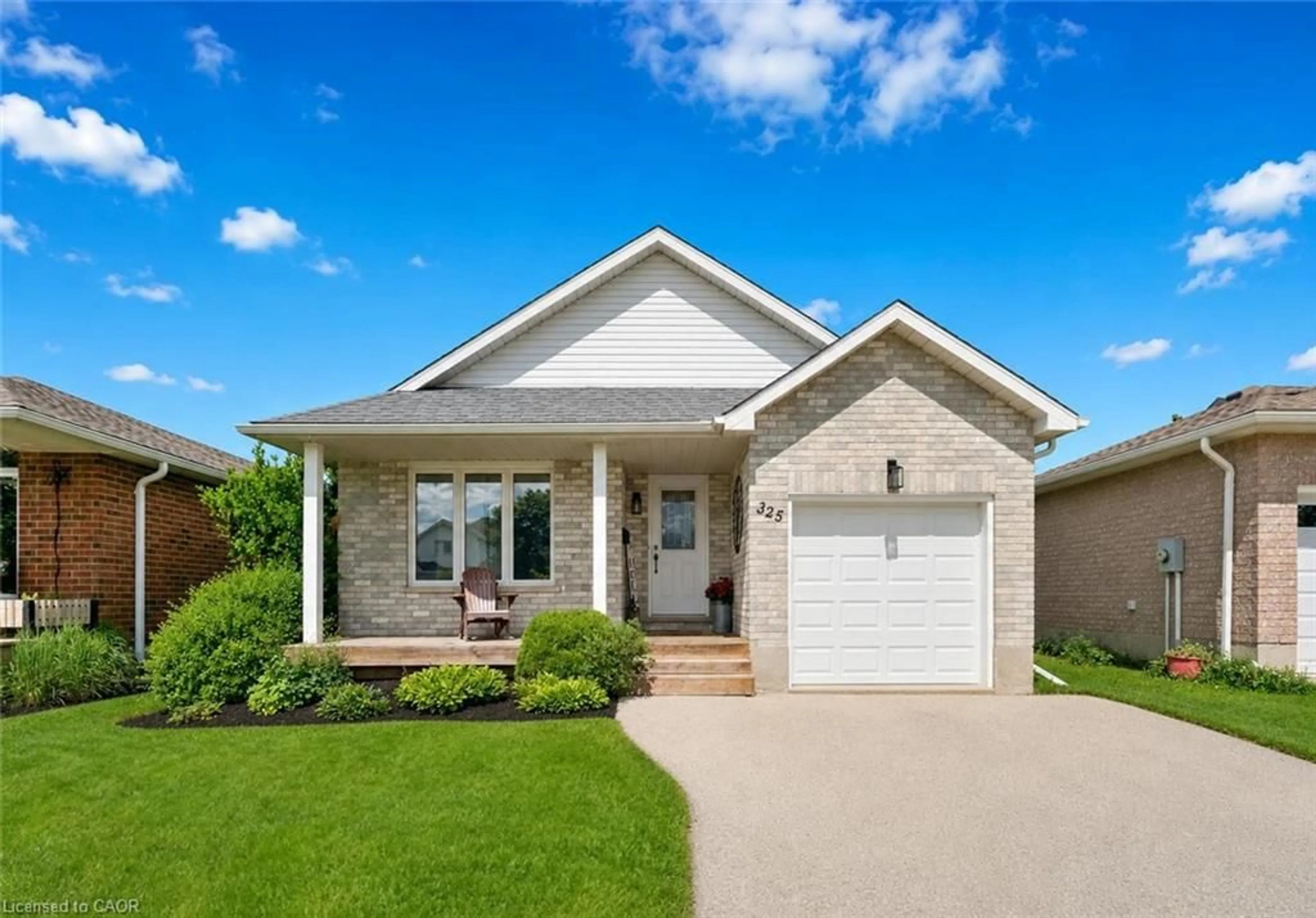 Home with brick exterior material, street for 325 Tait Cres, Fergus Ontario N1M 3P8