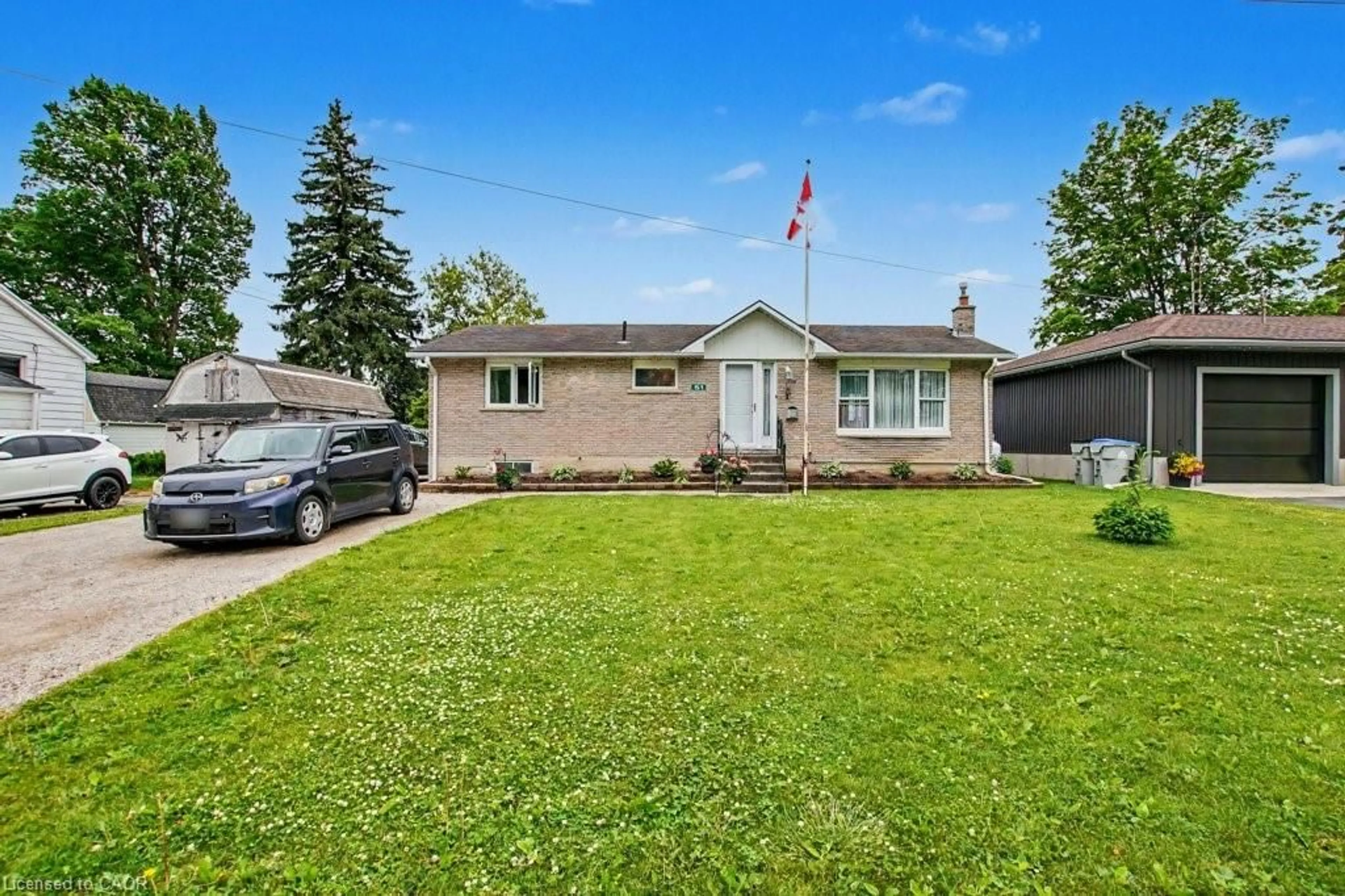 A pic from outside/outdoor area/front of a property/back of a property/a pic from drone, street for 51 Schade St, Monkton Ontario N0K 1P0