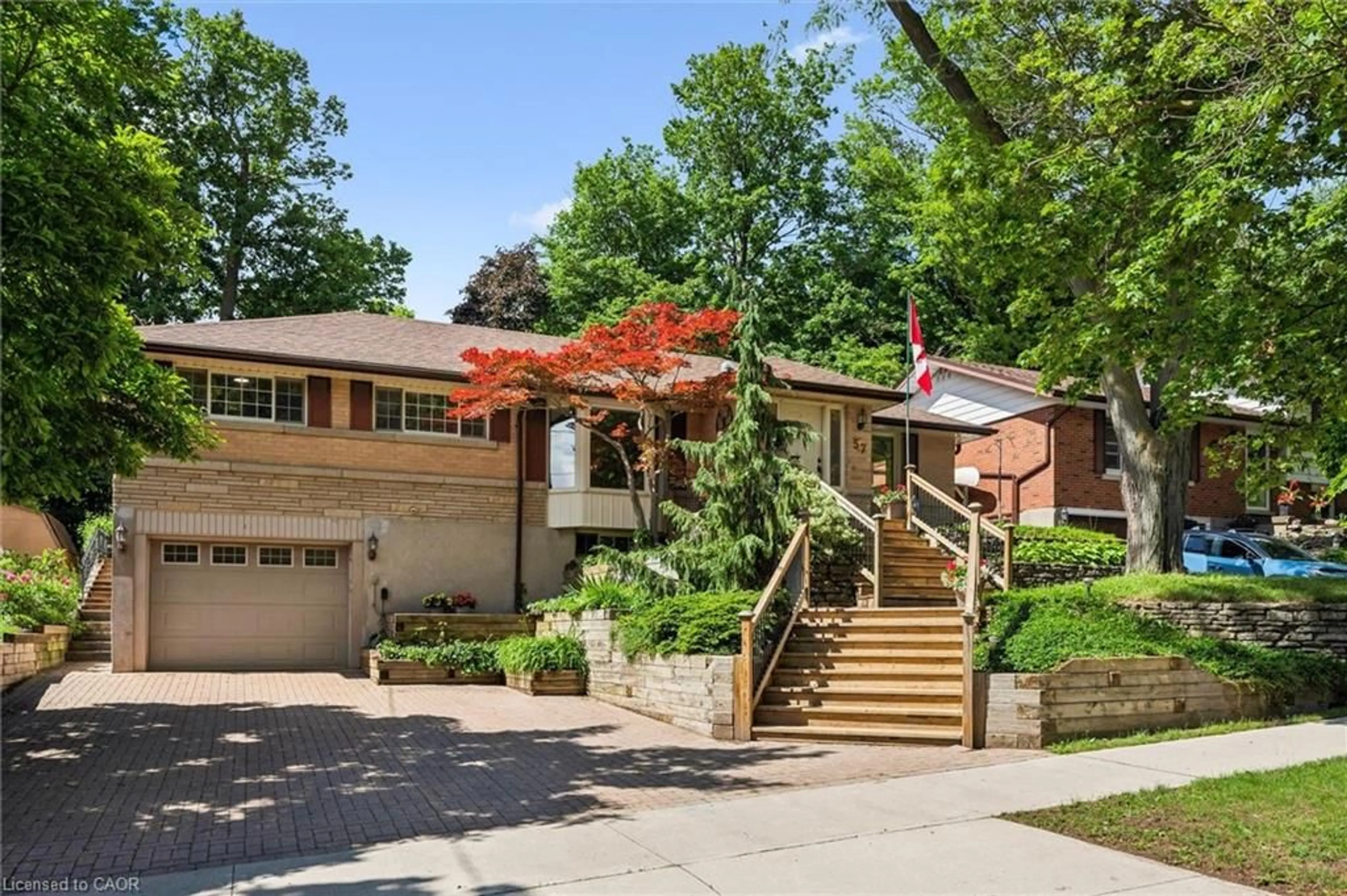 Home with brick exterior material, street for 57 Maplewood Pl, Kitchener Ontario N2H 4L4