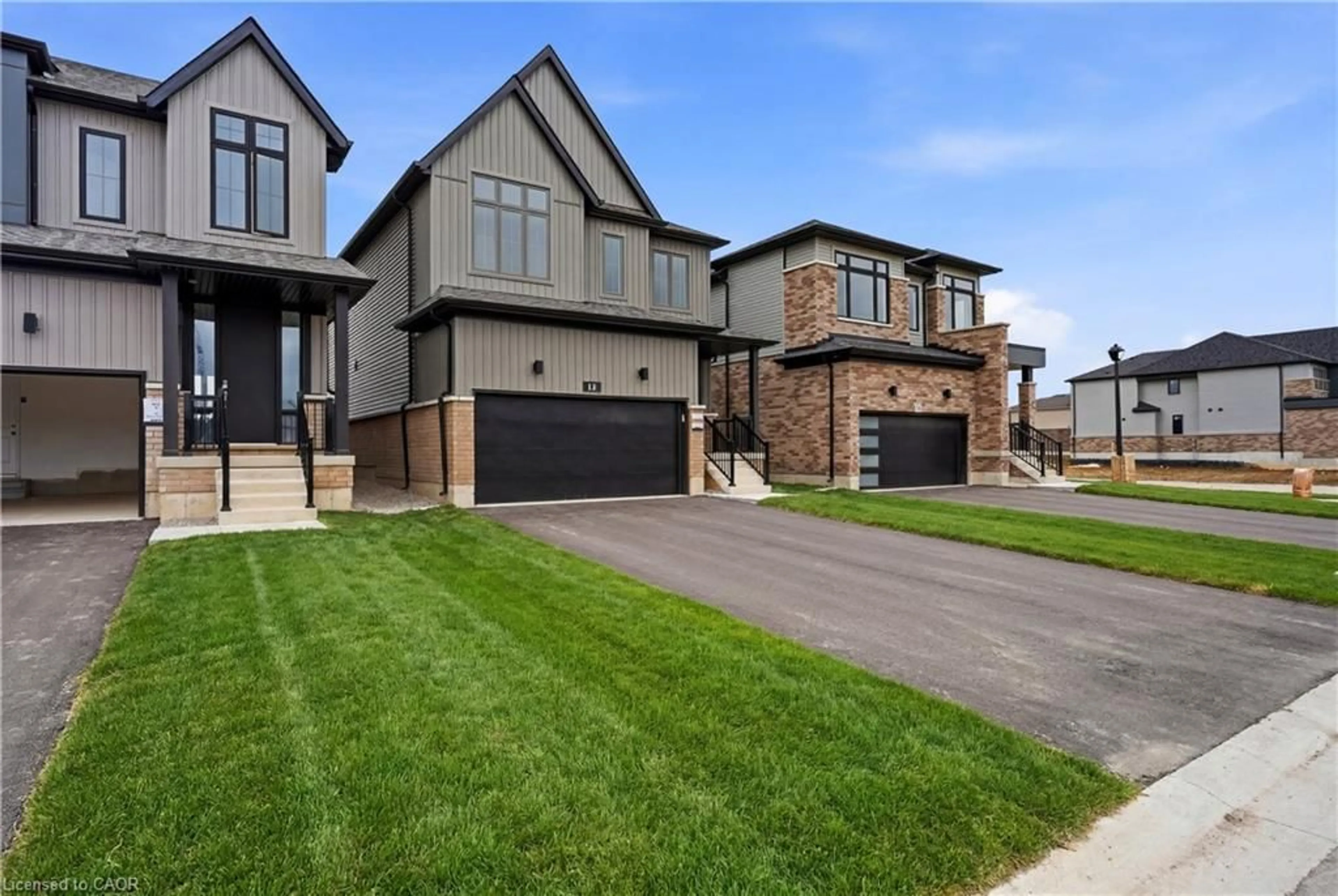 Home with brick exterior material, street for 14 Hepburn Pl, Stratford Ontario N5A 0M3