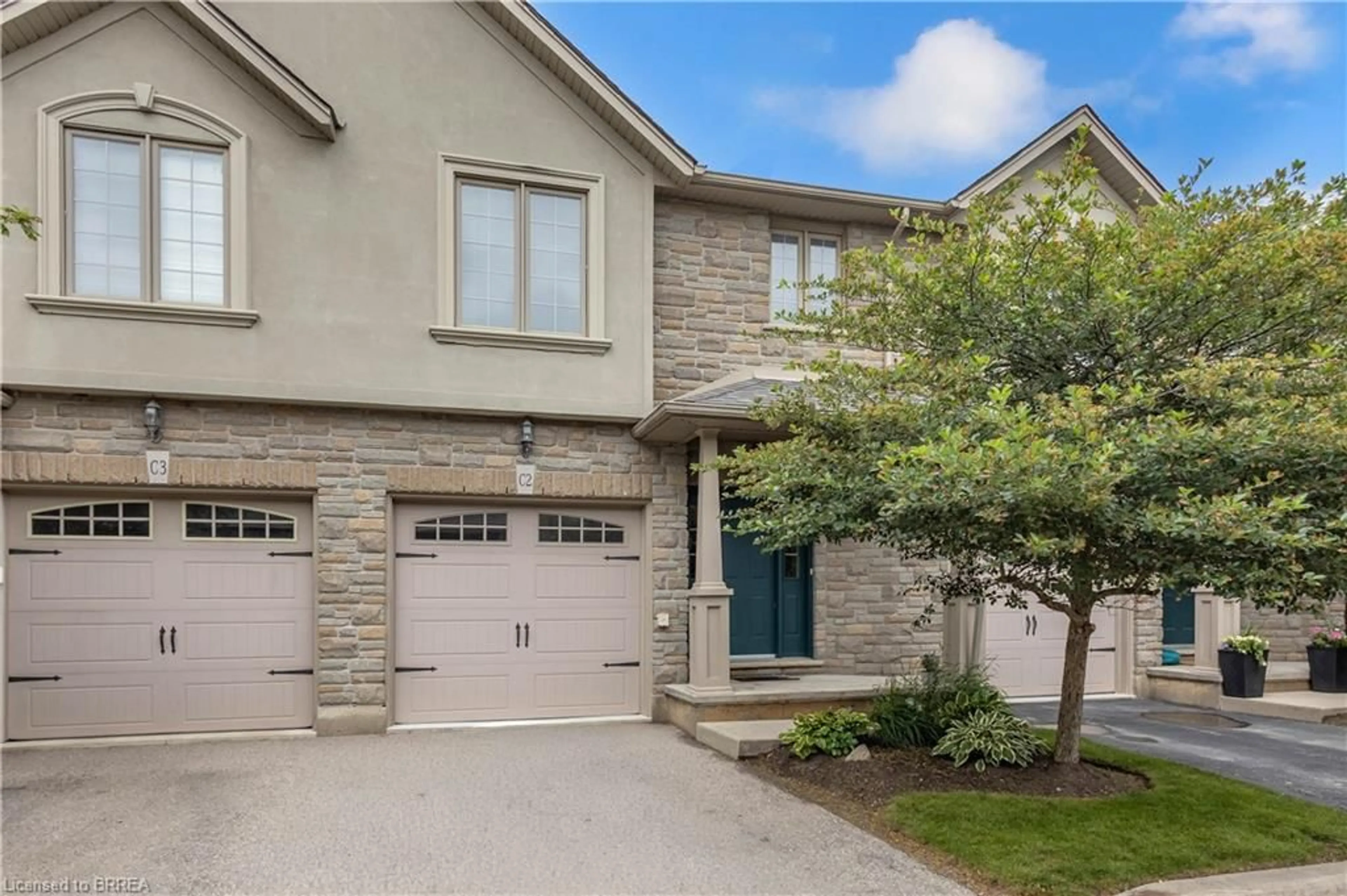 Home with brick exterior material, street for 12 Brantwood Park Rd #C2, Brantford Ontario N3P 1G2