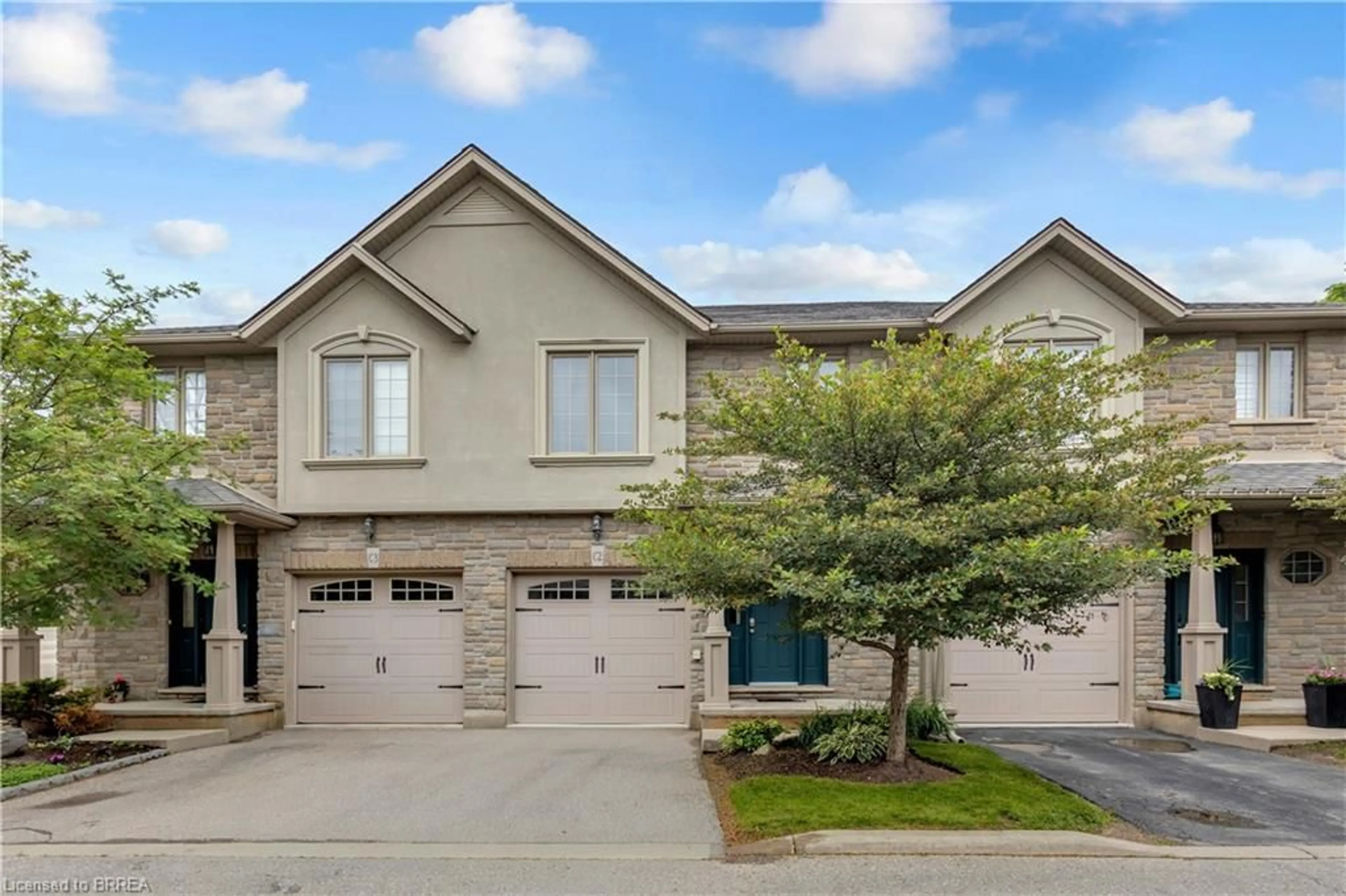 Home with brick exterior material, street for 12 Brantwood Park Rd #C2, Brantford Ontario N3P 1G2