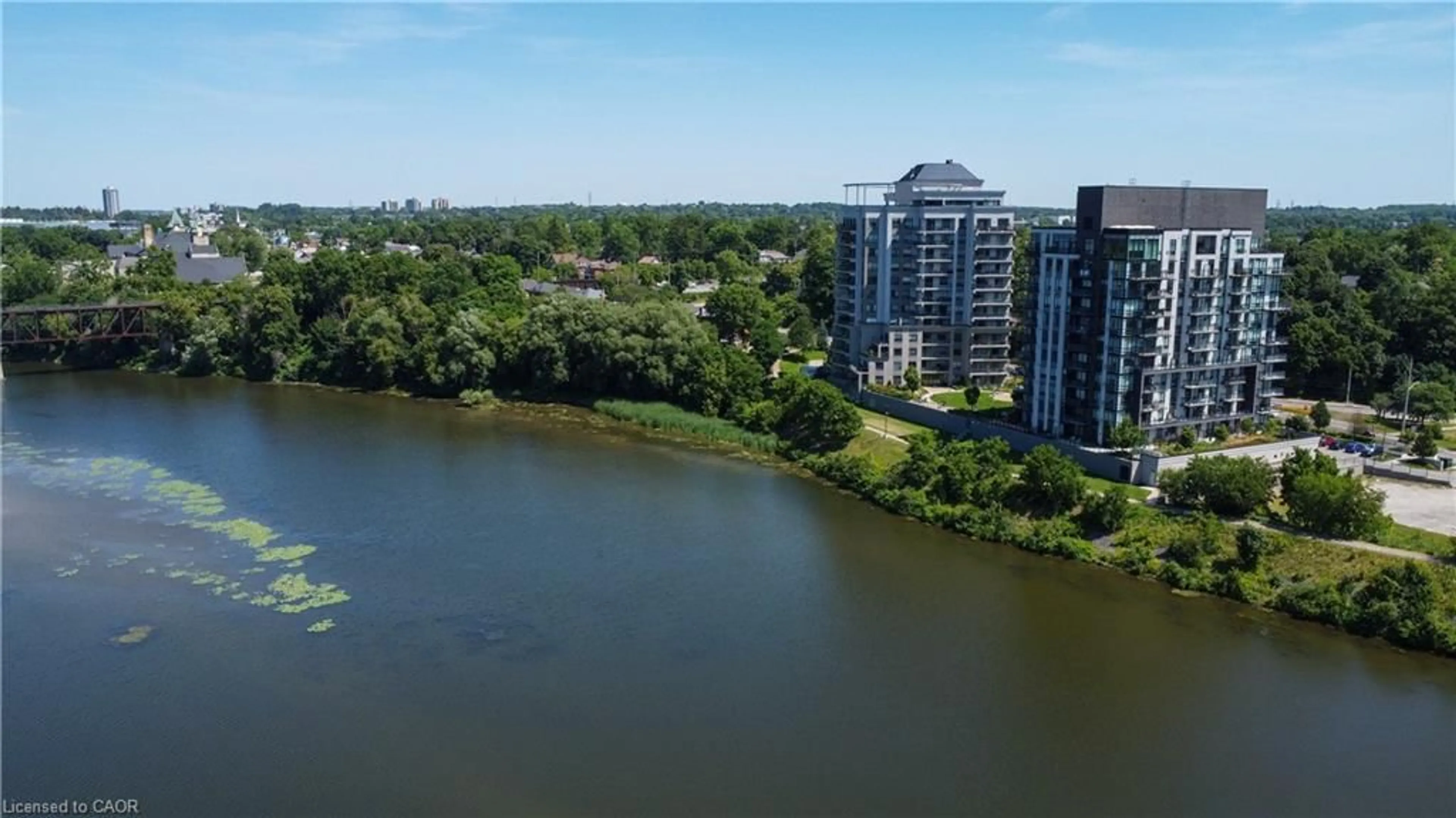 A pic from outside/outdoor area/front of a property/back of a property/a pic from drone, water/lake/river/ocean view for 170 Water St #502, Cambridge Ontario N1R 3B6