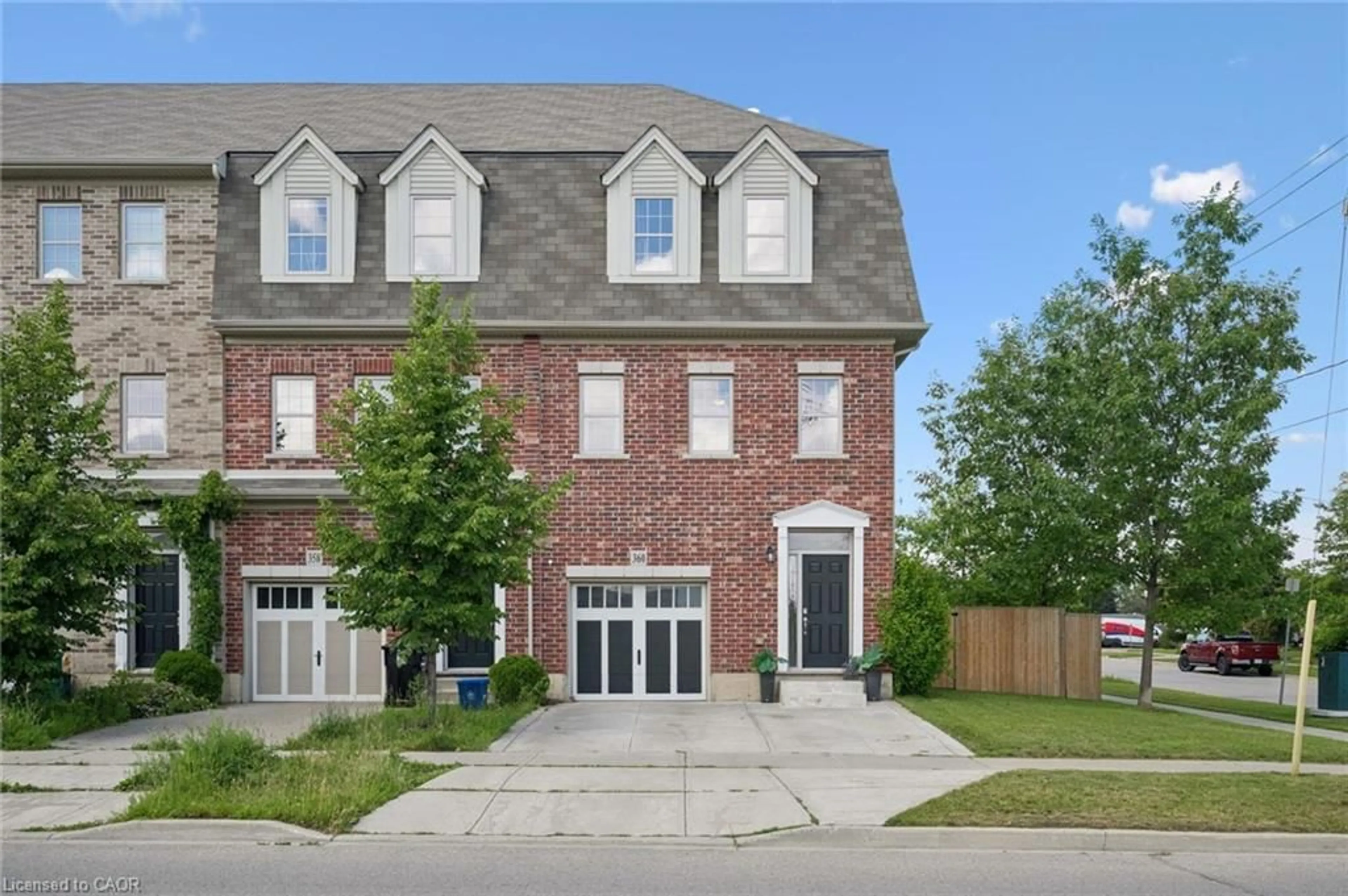 Home with brick exterior material, street for 360 Louisa St, Kitchener Ontario N2H 0B2