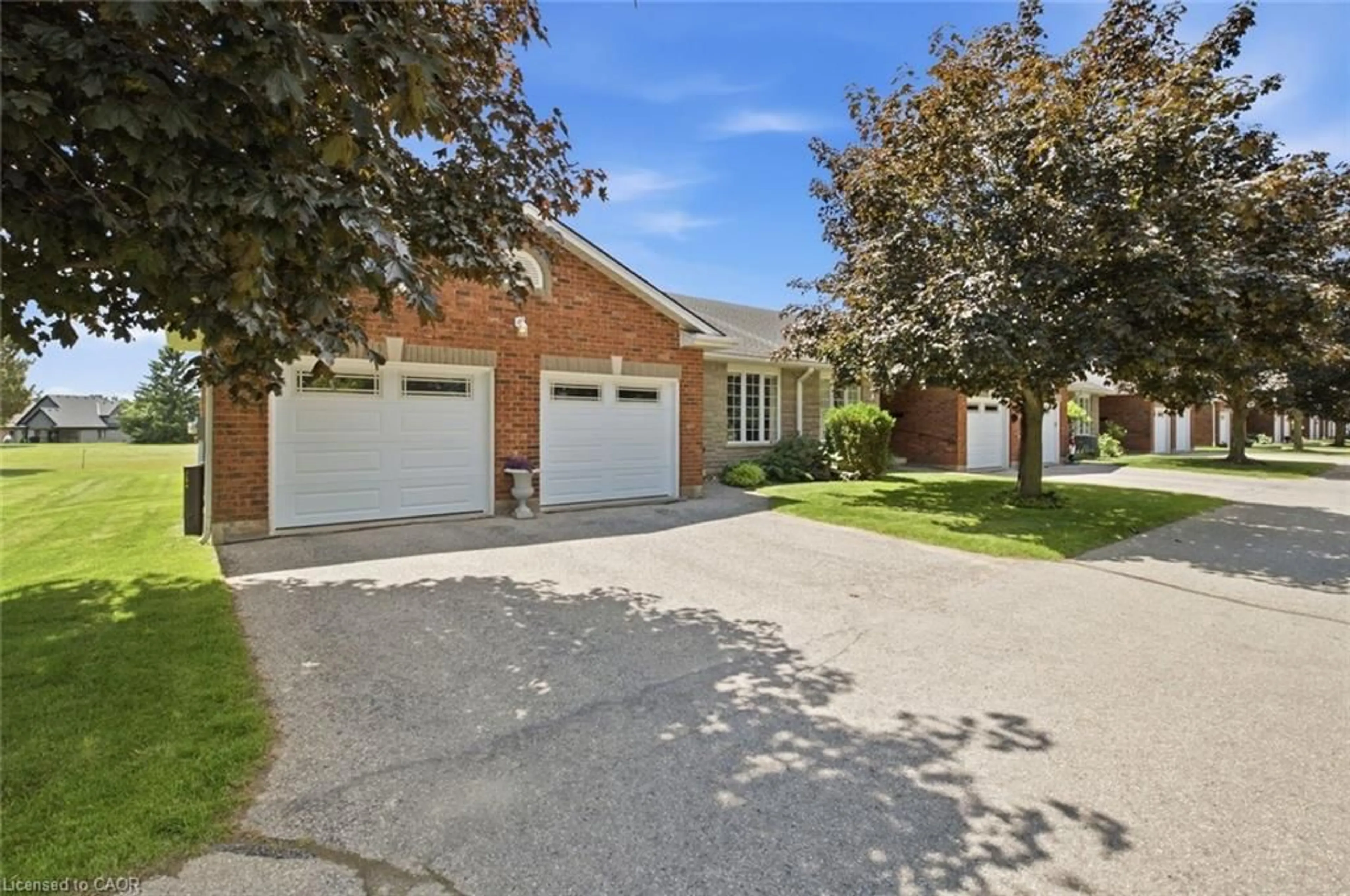 Home with brick exterior material, street for 74 Wilson Ave #12, Delhi Ontario N4B 3E7