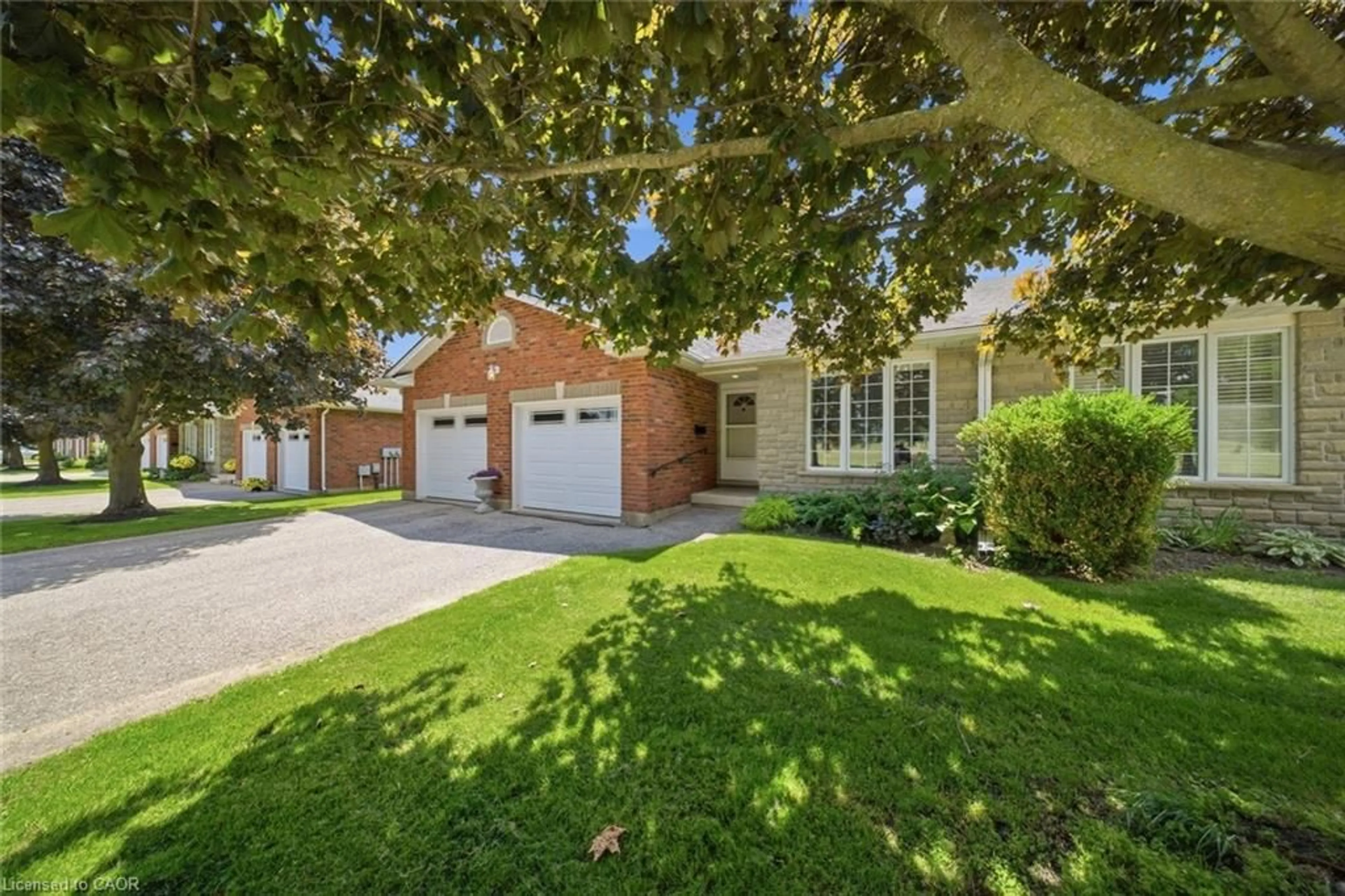 Home with brick exterior material, street for 74 Wilson Ave #12, Delhi Ontario N4B 3E7