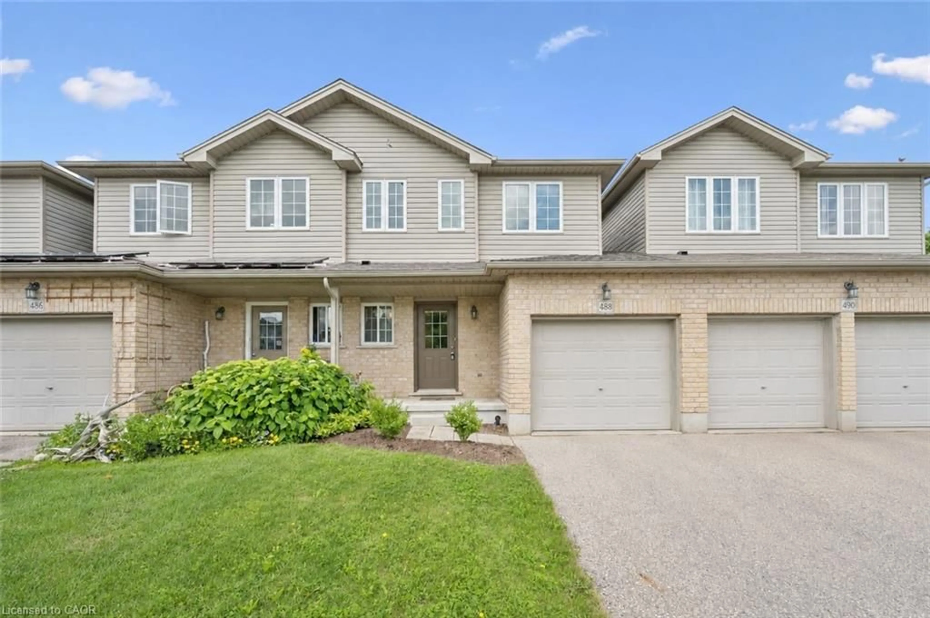 Home with brick exterior material, street for 488 Colt St, Waterloo Ontario N2K 4N9