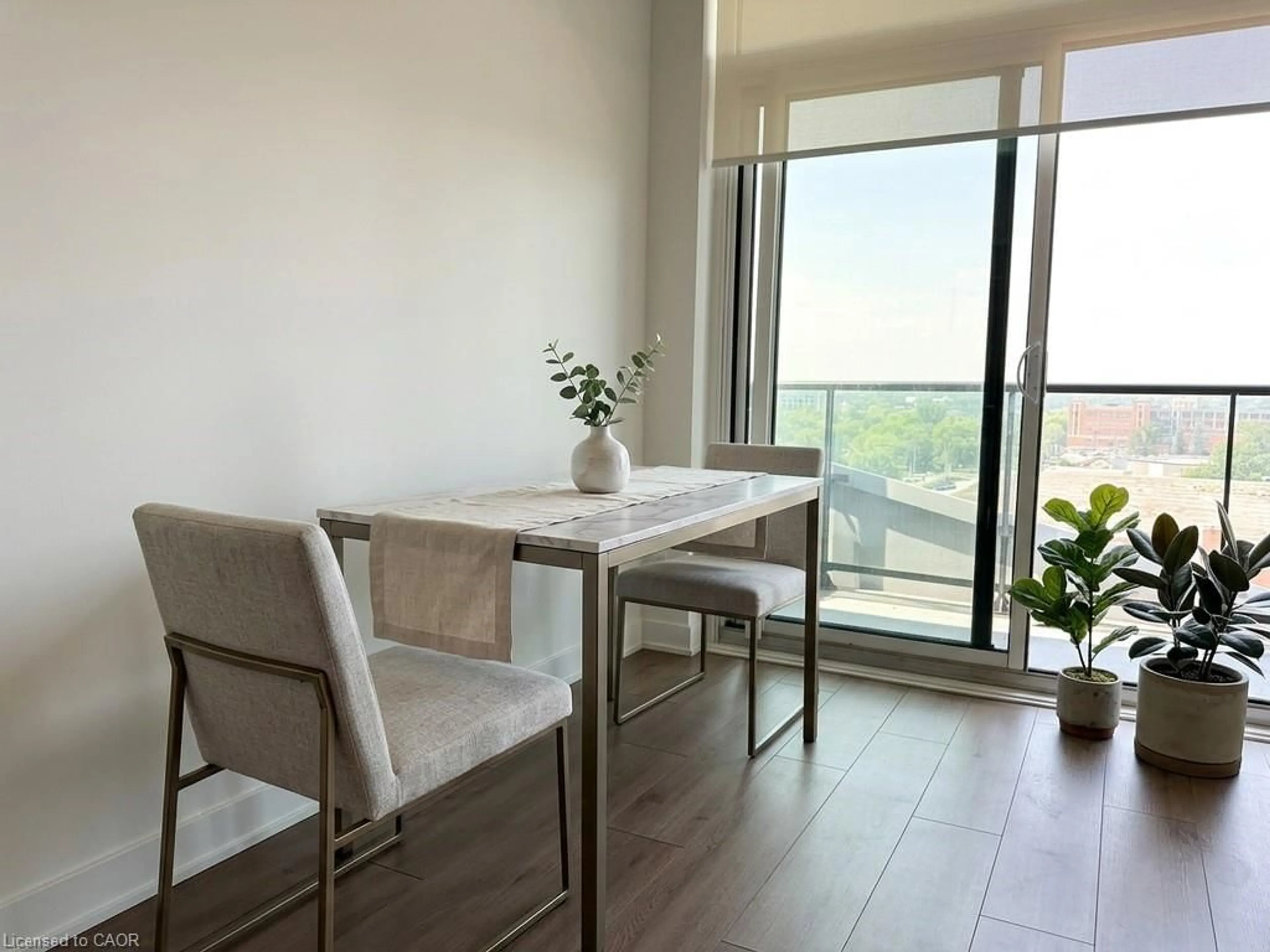 Dining room, wood/laminate floor for 25 Wellington St #705, Kitchener Ontario N2G 0G5