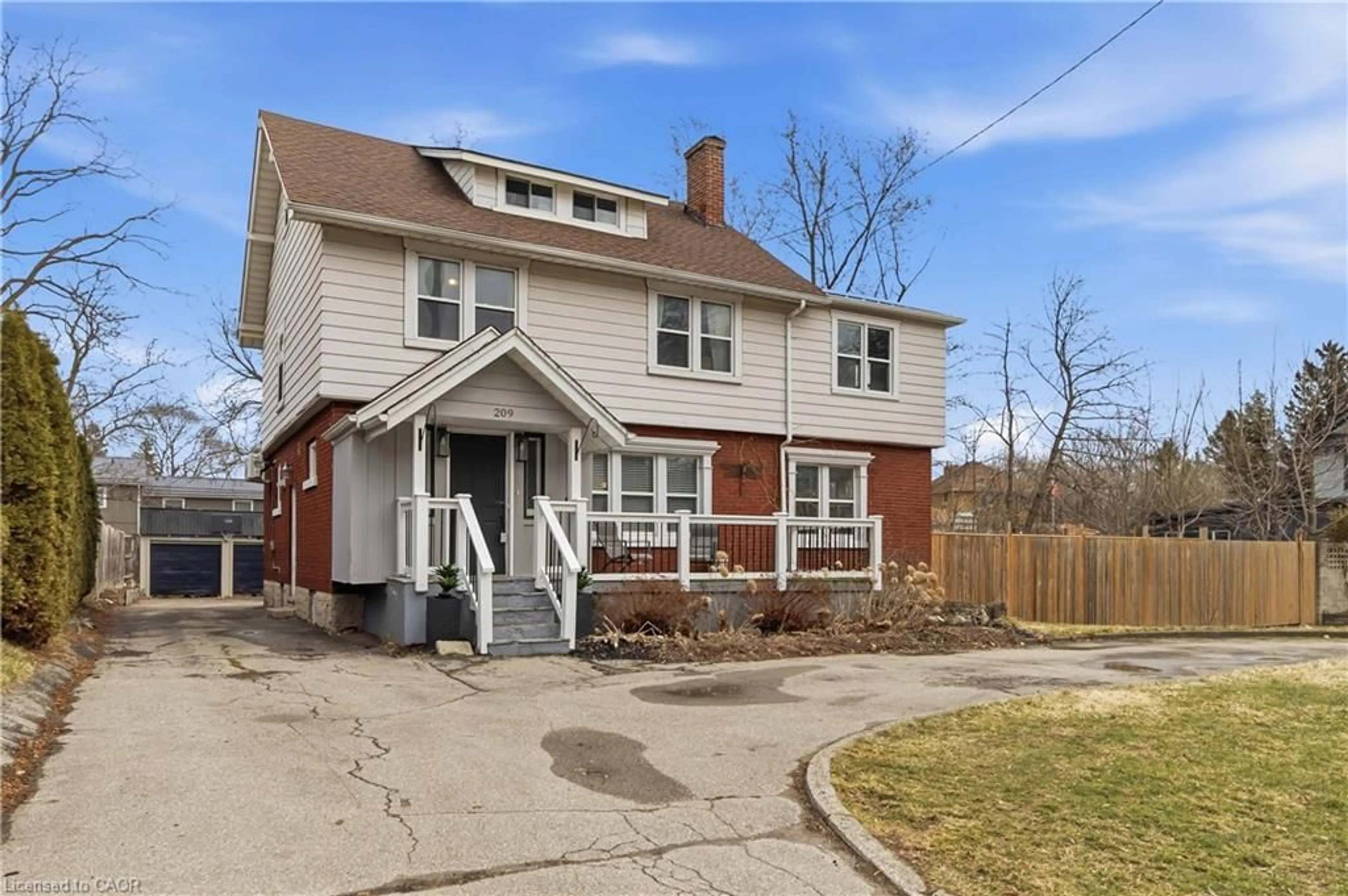 Home with brick exterior material, street for 209 Grand River St, Paris Ontario N3L 2N4