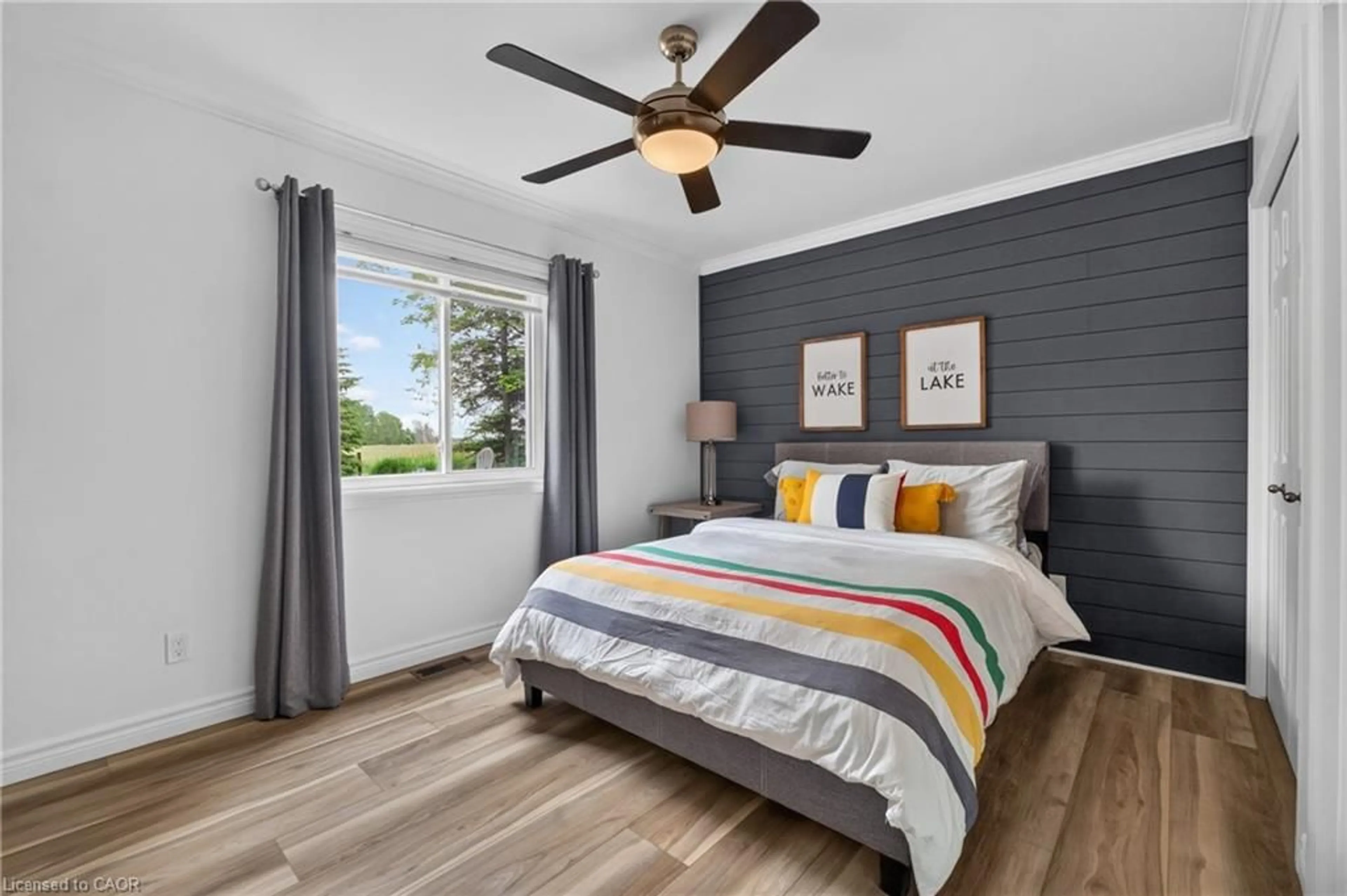 Bedroom with bed, wood/laminate floor for 85373 Mackenzie Camp Rr#3 Rd, Ashfield-Colborne-Wawanosh Ontario N7A 3X9