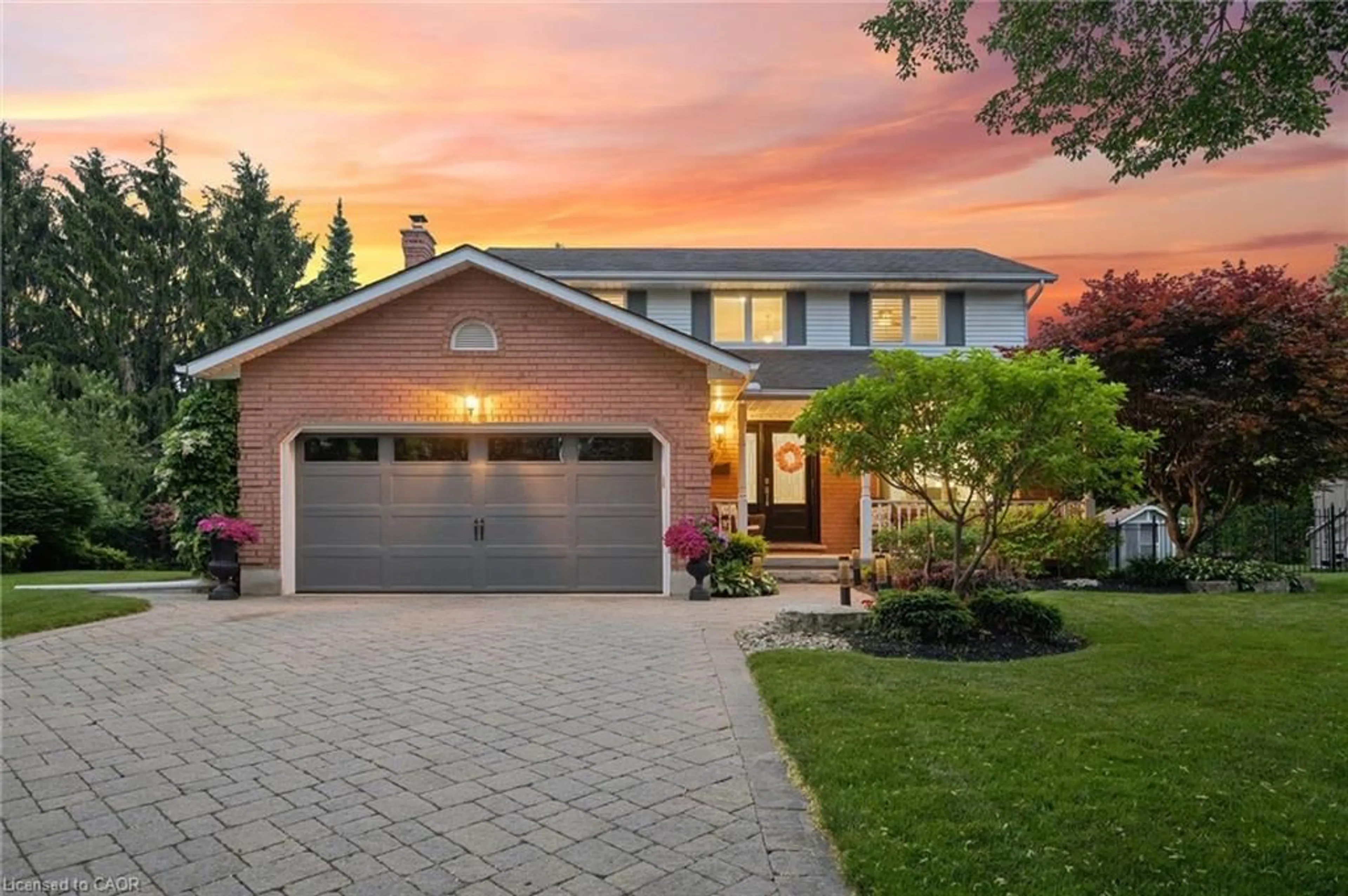 Home with brick exterior material, street for 18 Dunnington Crt, Kitchener Ontario N2A 3M5