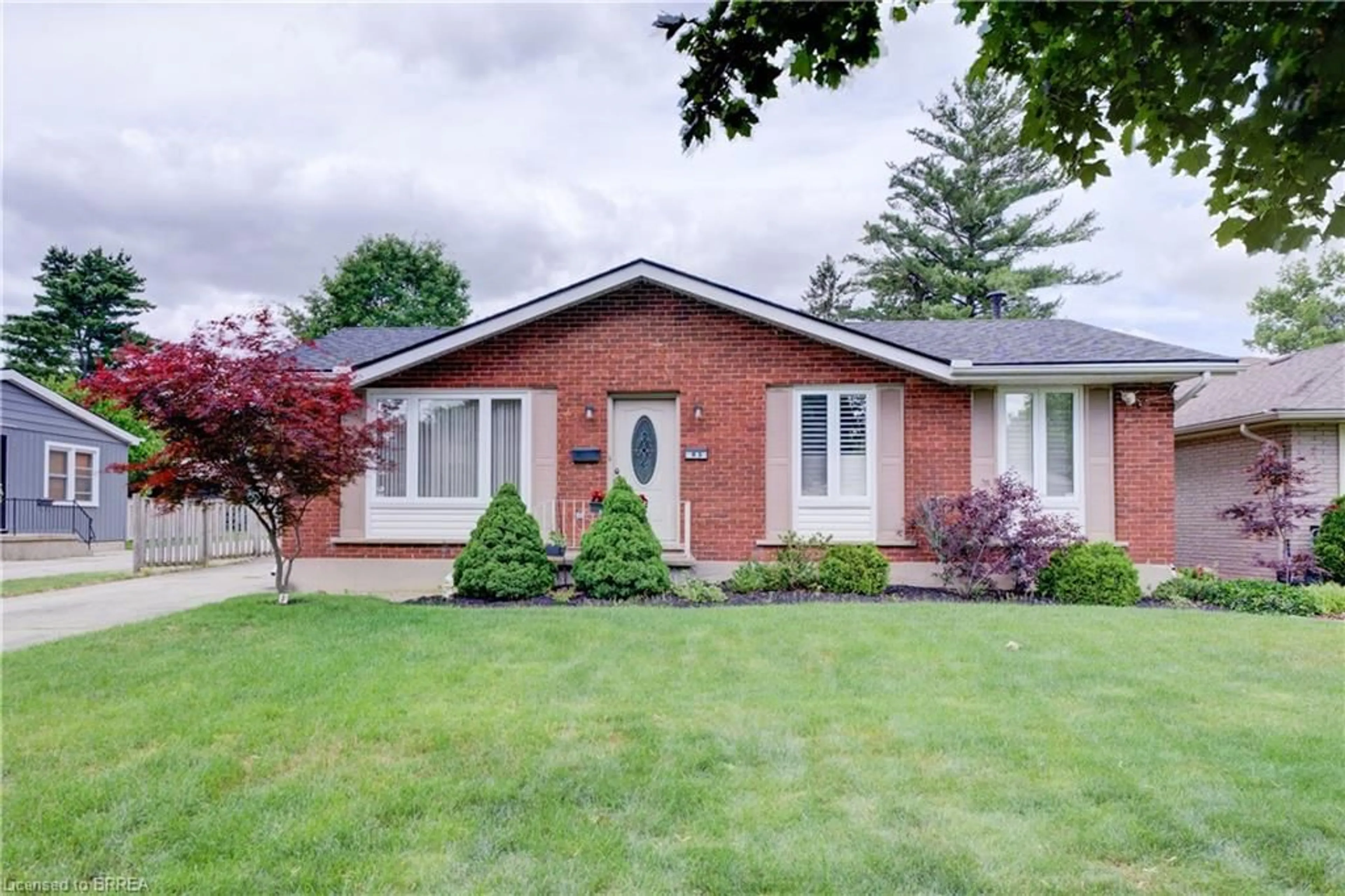 Home with brick exterior material, street for 83 Evelyn St, Brantford Ontario N3R 3H2