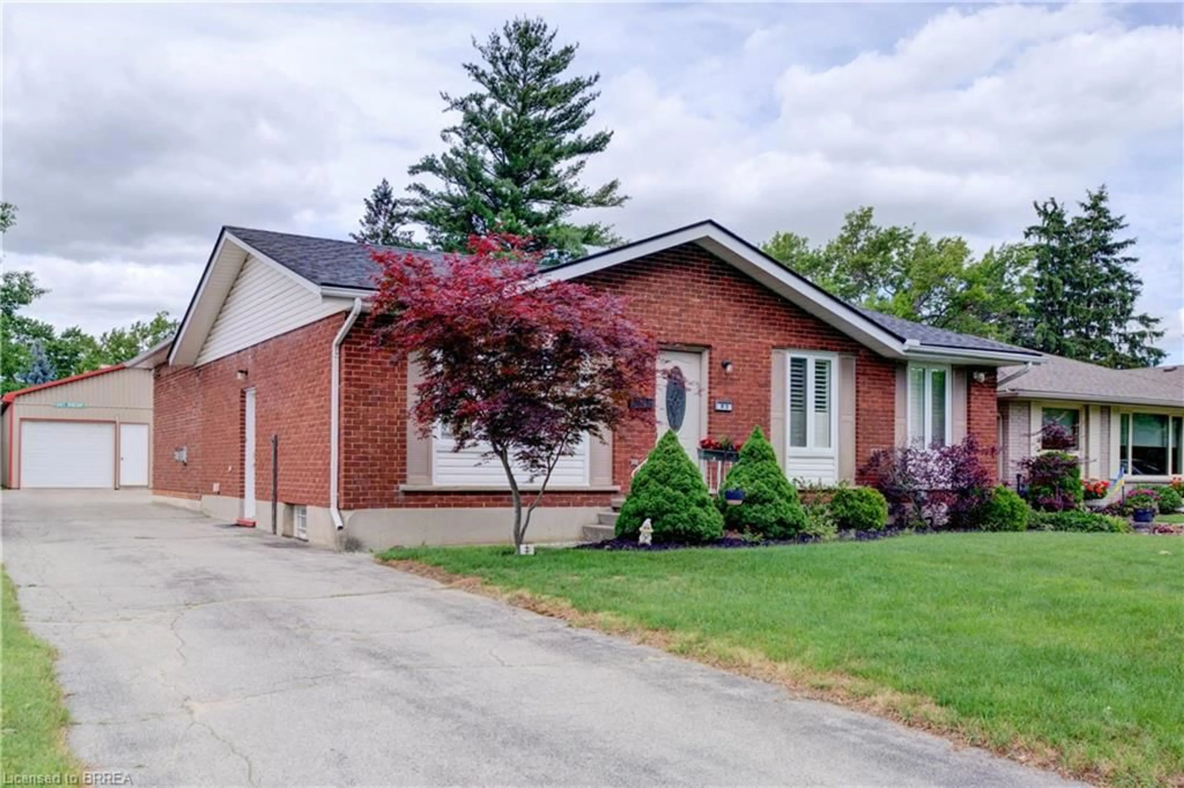 Home with brick exterior material, street for 83 Evelyn St, Brantford Ontario N3R 3H2