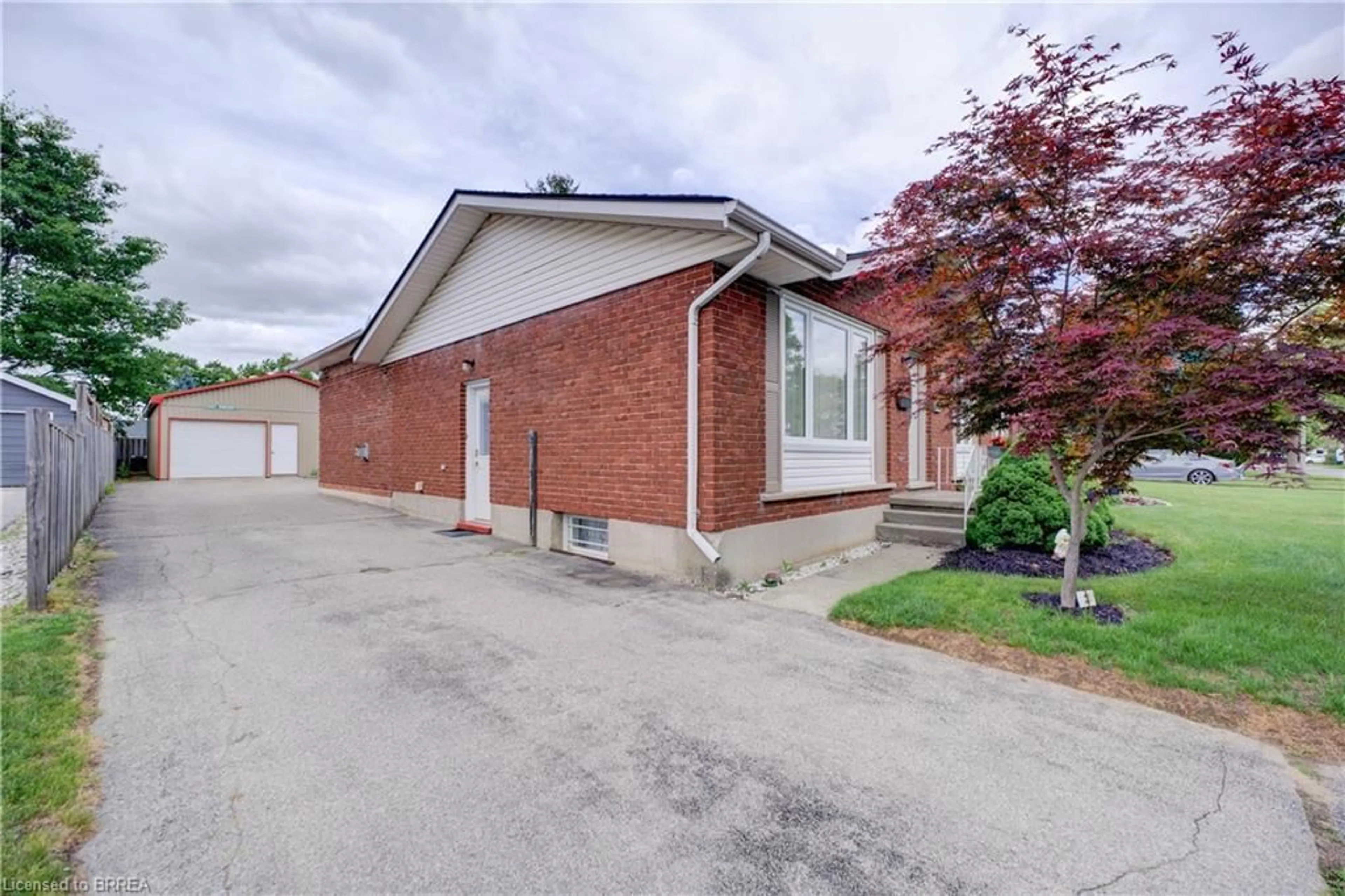Home with brick exterior material, street for 83 Evelyn St, Brantford Ontario N3R 3H2