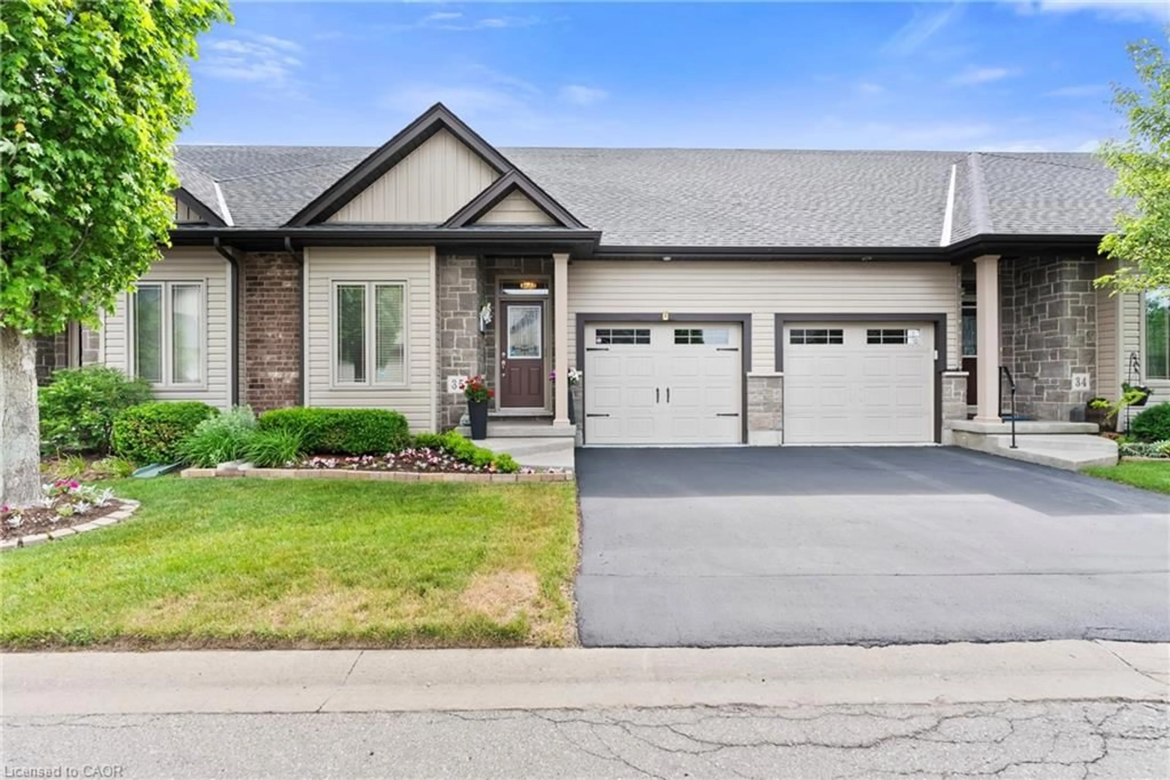 Home with brick exterior material, street for 9440 Eagle Ridge Dr #35, Niagara Falls Ontario L2H 0G6