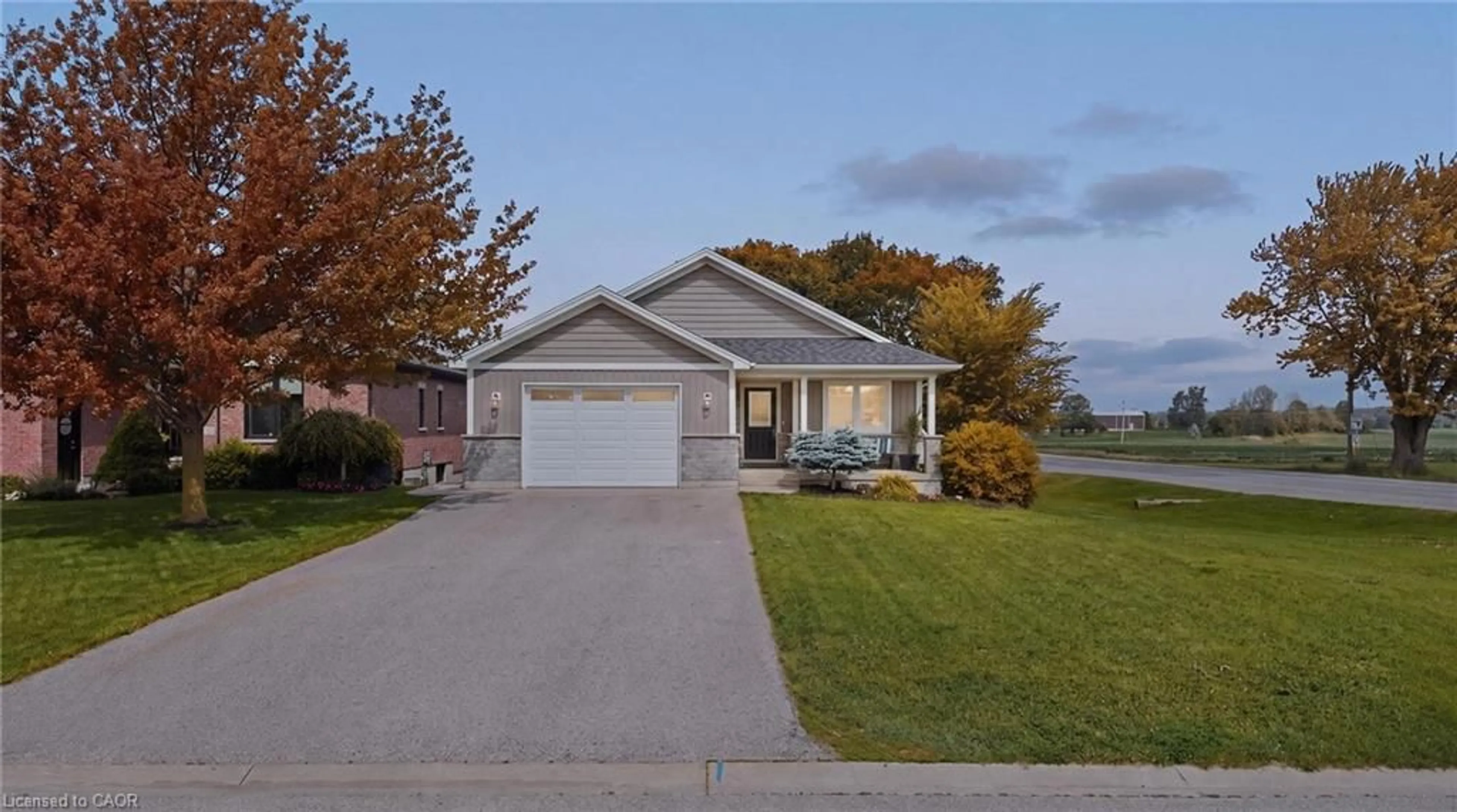 Home with vinyl exterior material, street for 101 Tuffy Macdougall Crt, Harriston Ontario N0G 1Z0