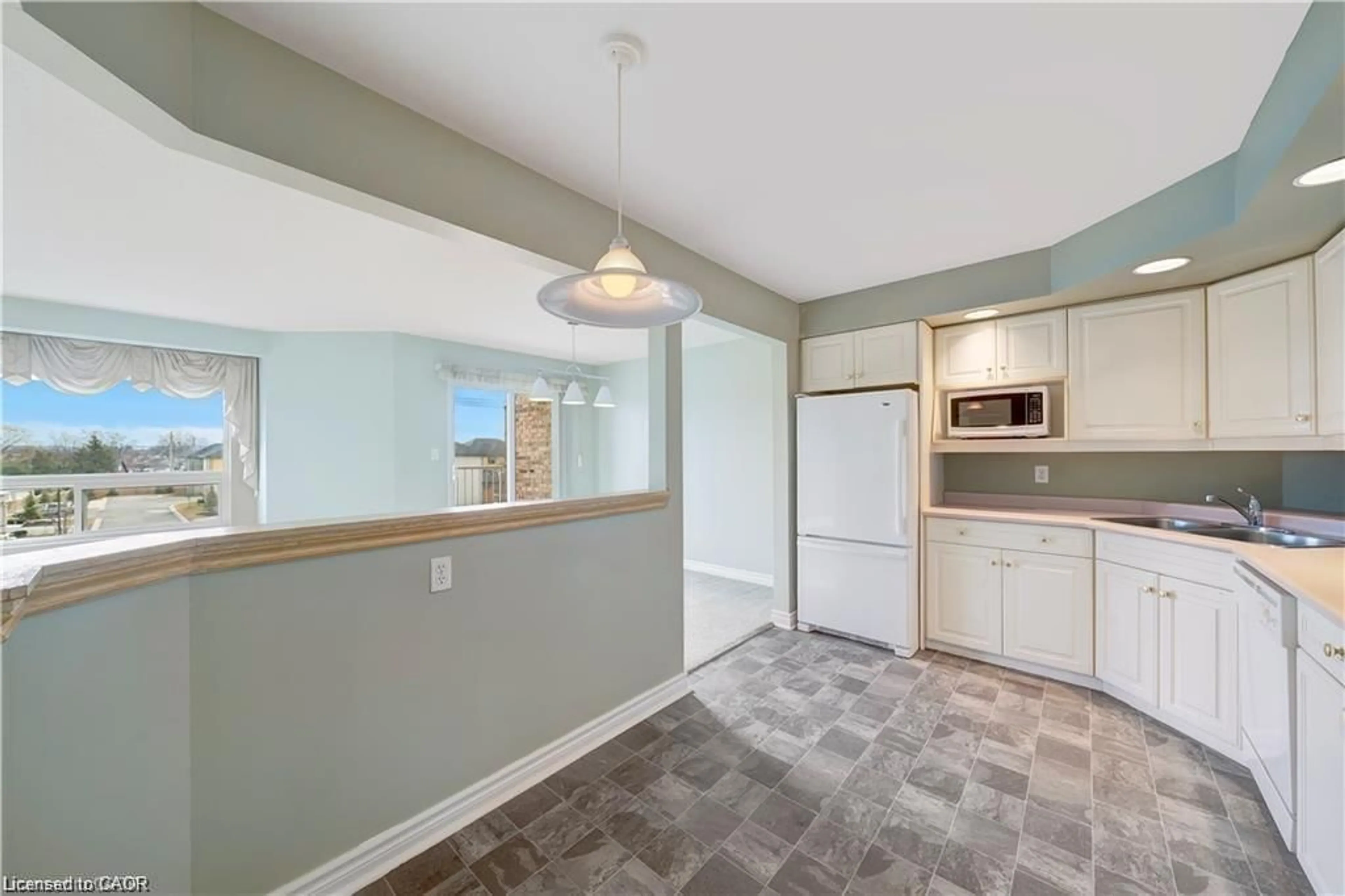 Open concept kitchen, ceramic/tile floor for 1061 Vansickle Rd #303B, St. Catharines Ontario L2M 2X4