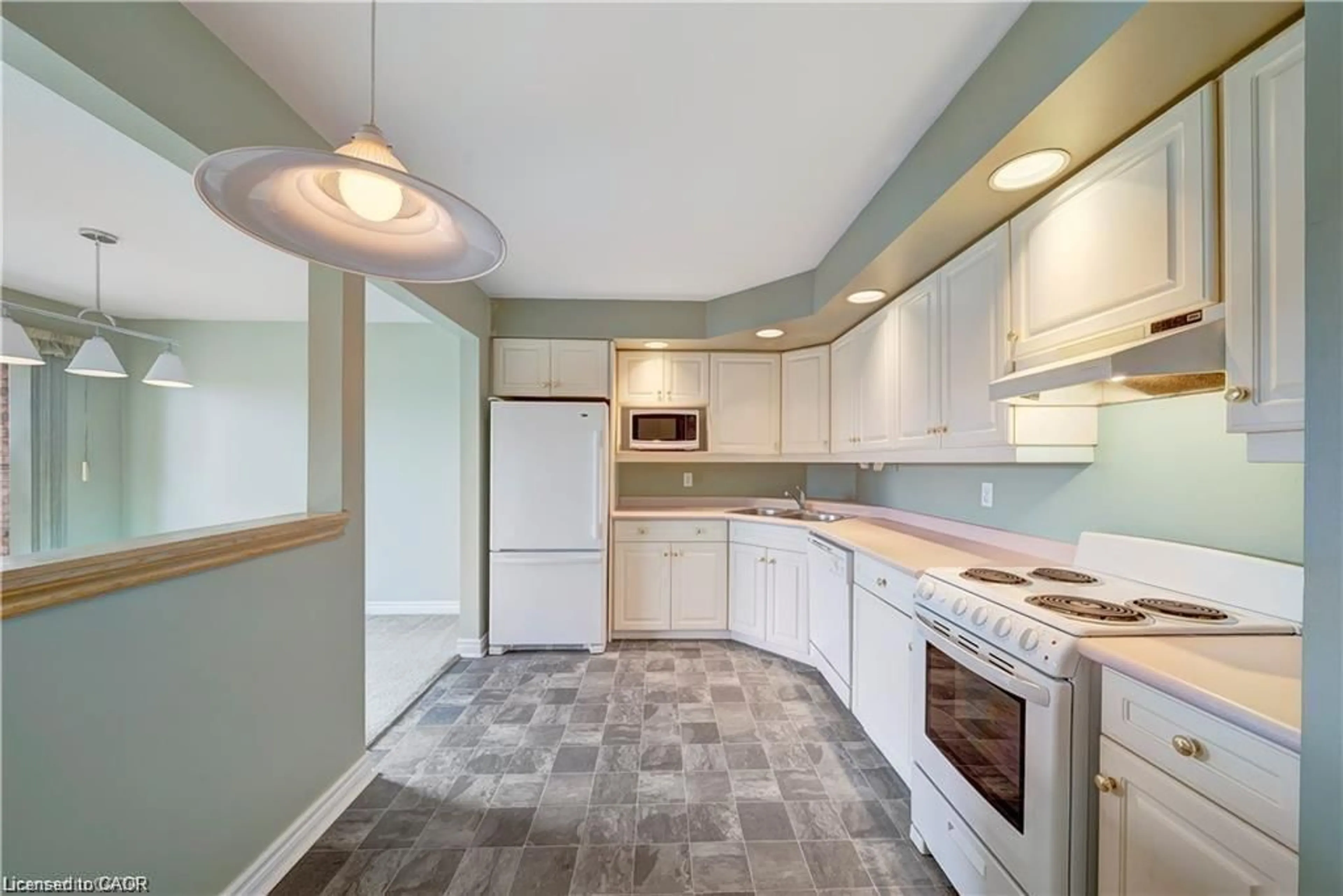Standard kitchen, ceramic/tile floor for 1061 Vansickle Rd #303B, St. Catharines Ontario L2M 2X4