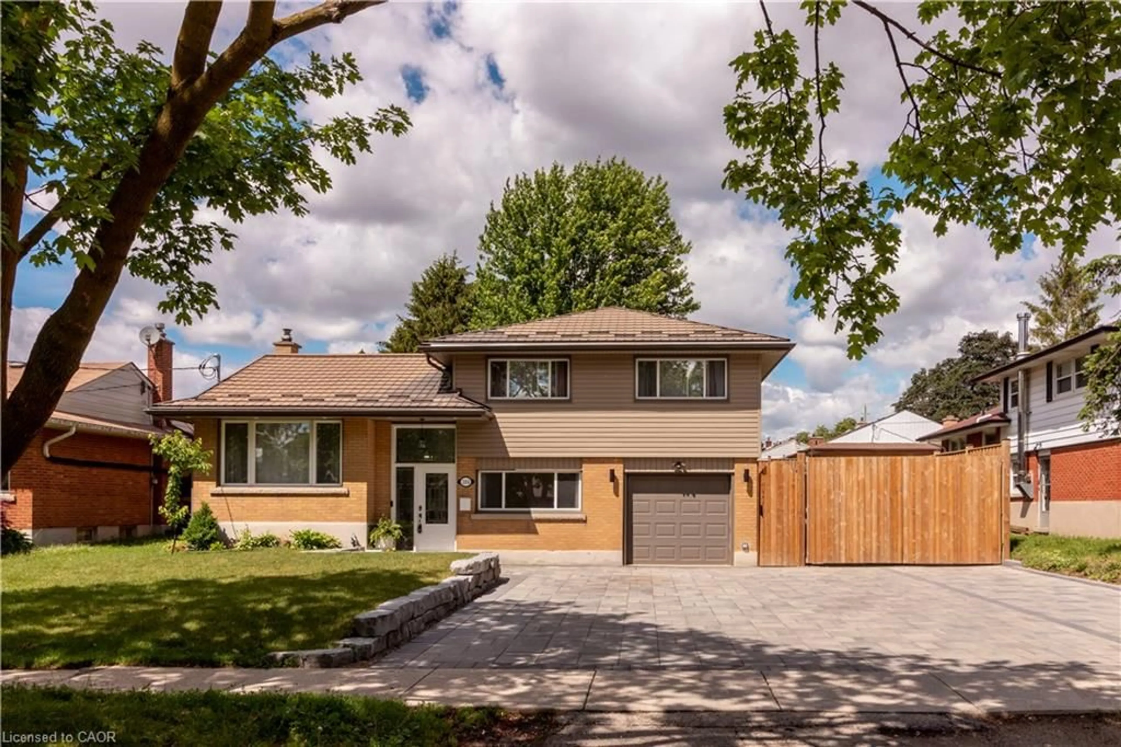 Home with brick exterior material, street for 304 Greenfield Ave, Kitchener Ontario N2C 1E1