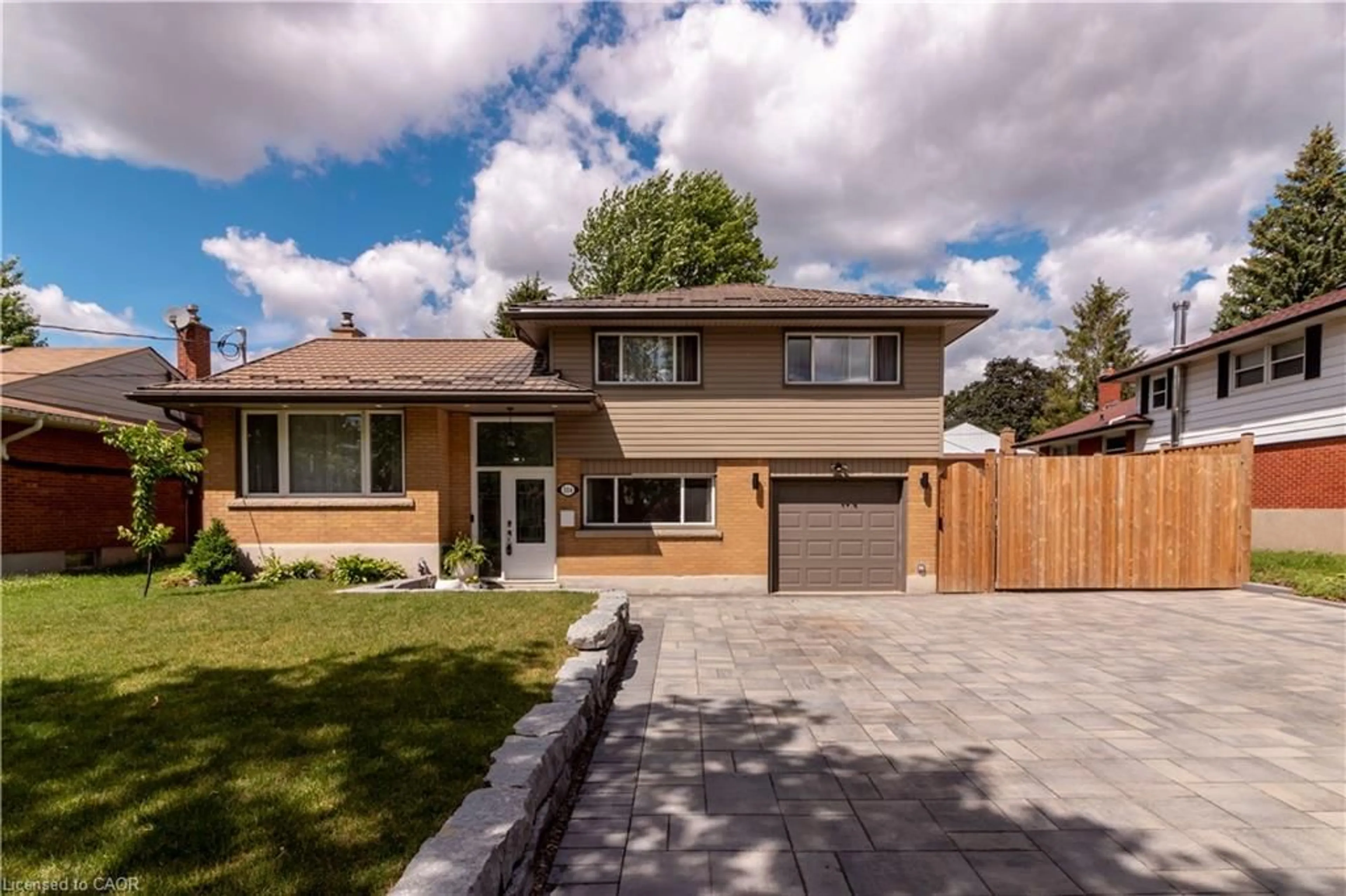 Home with brick exterior material, street for 304 Greenfield Ave, Kitchener Ontario N2C 1E1