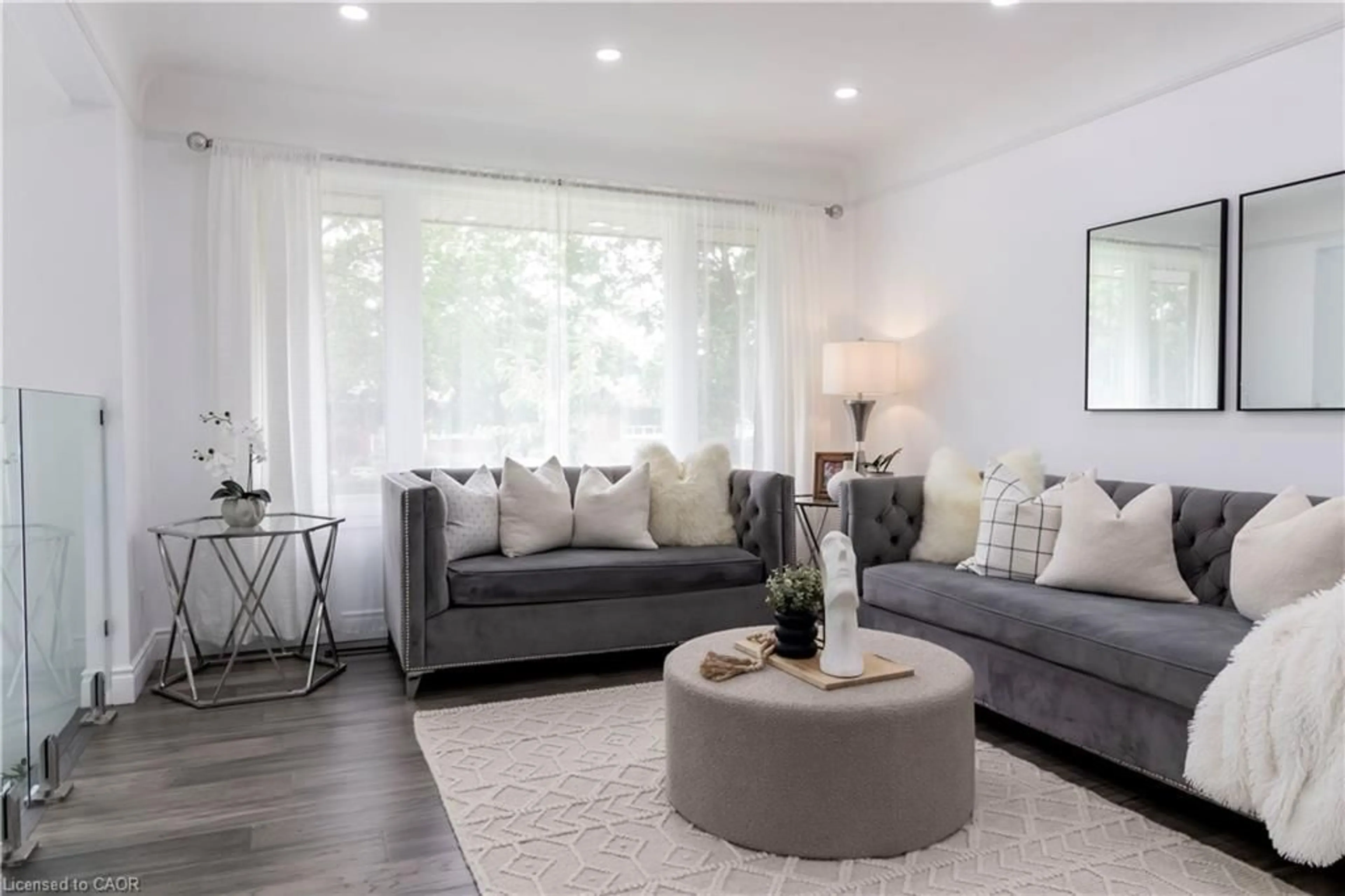 Living room with furniture, wood/laminate floor for 304 Greenfield Ave, Kitchener Ontario N2C 1E1