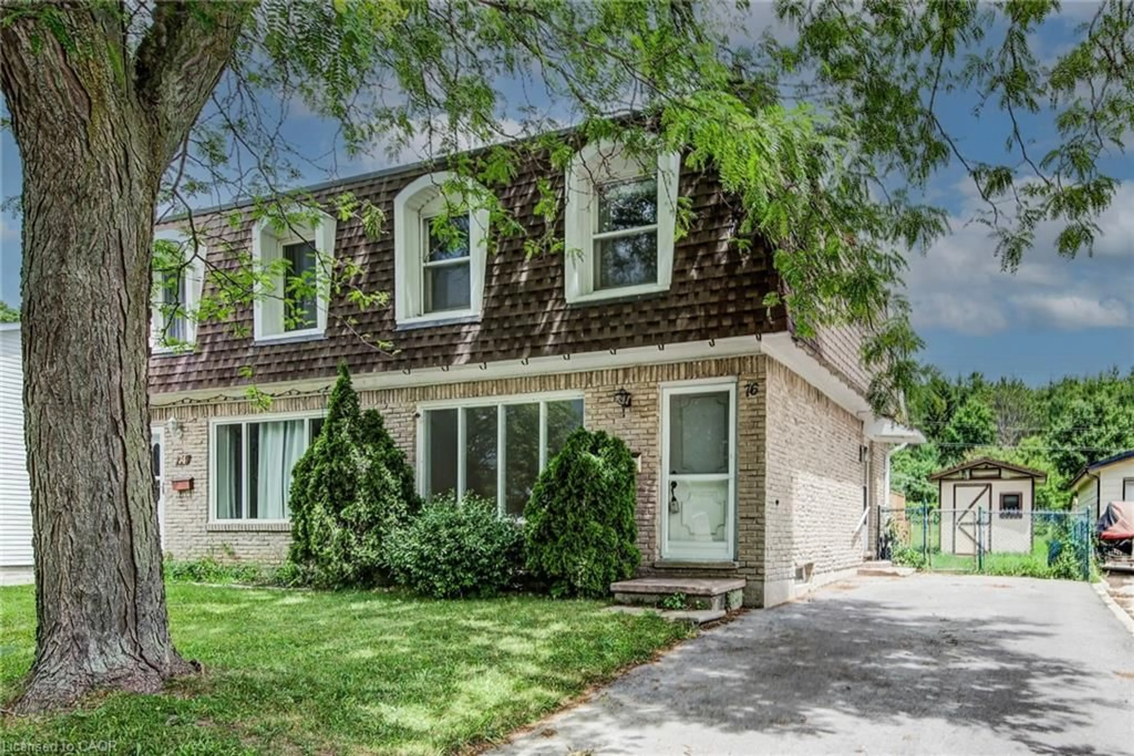 Home with brick exterior material, street for 76 Pepperwood Cres, Kitchener Ontario N2A 2R3