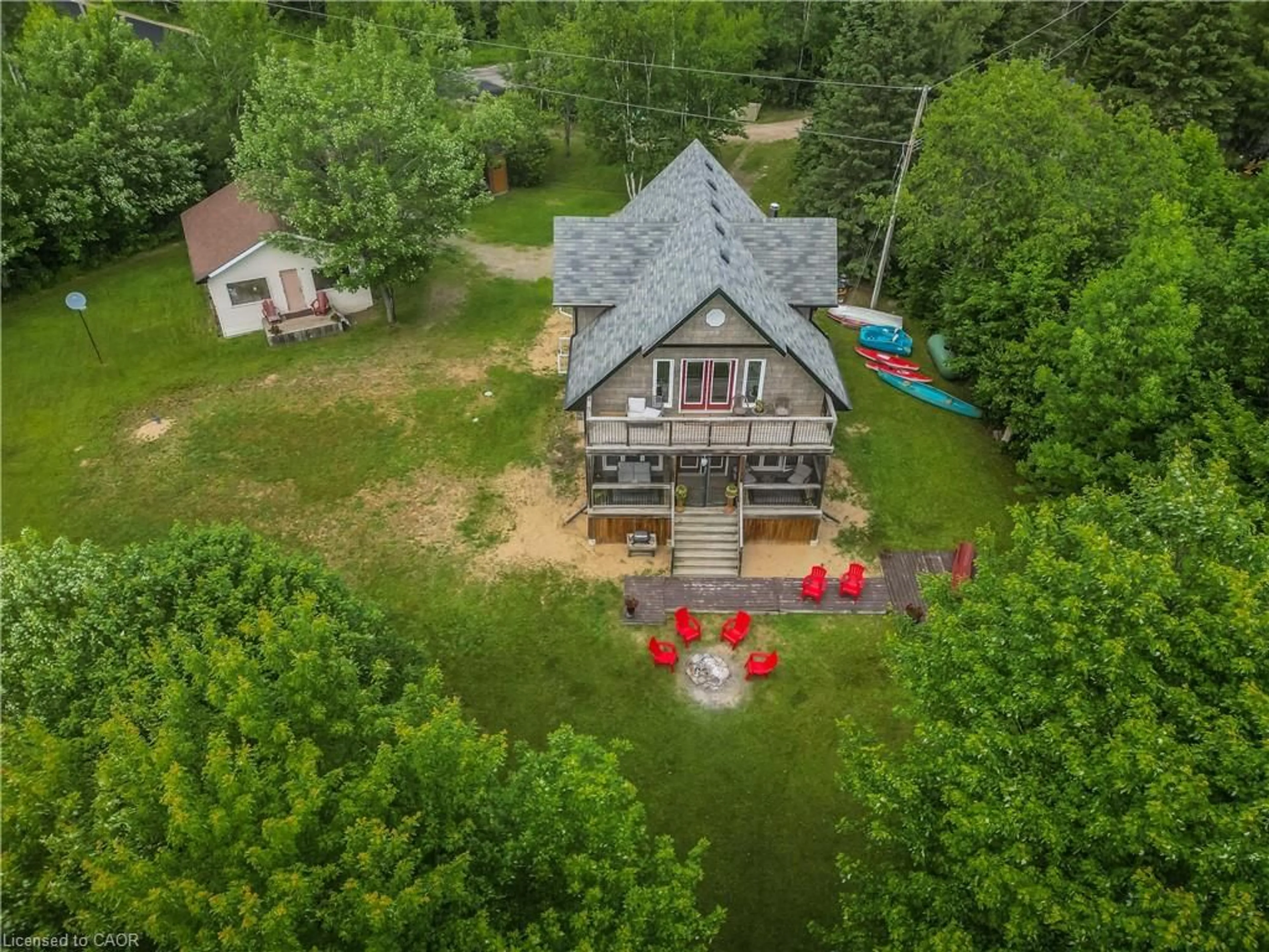 A pic from outside/outdoor area/front of a property/back of a property/a pic from drone, unknown for 5 Bridge Rd, Magnetawan Ontario P0A 1P0
