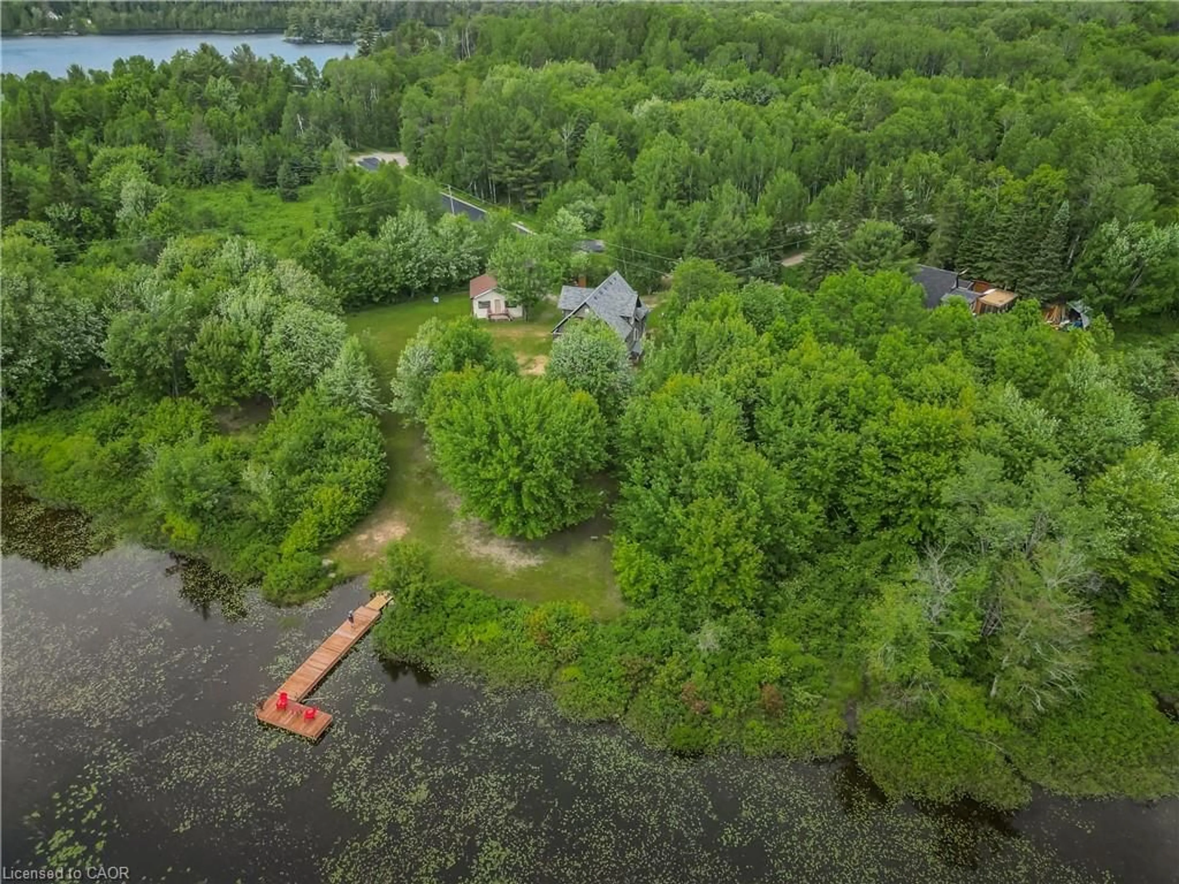 A pic from outside/outdoor area/front of a property/back of a property/a pic from drone, water/lake/river/ocean view for 5 Bridge Rd, Magnetawan Ontario P0A 1P0