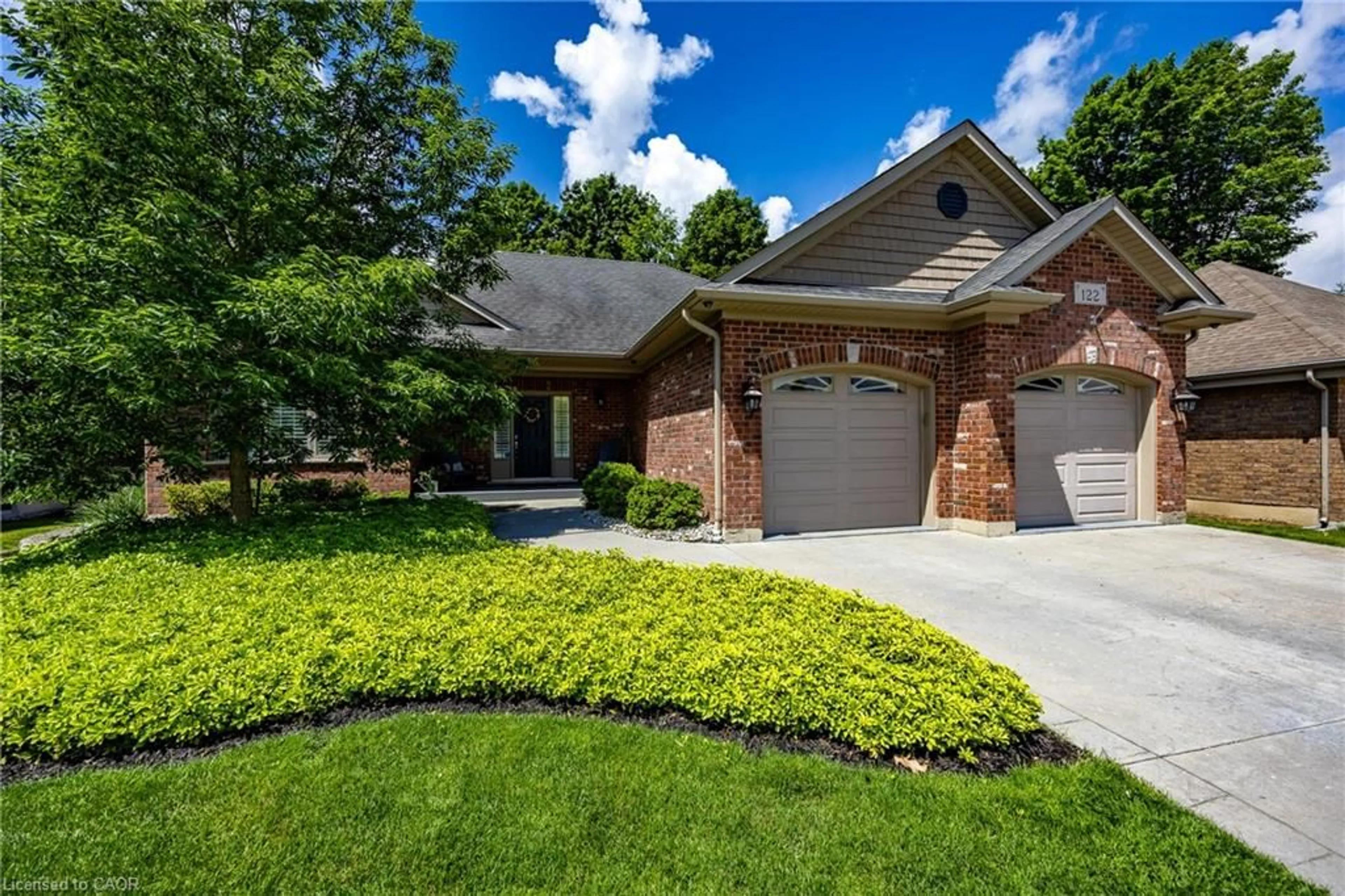 Home with brick exterior material, street for 122 Donjon Blvd, Port Dover Ontario N0A 1N7