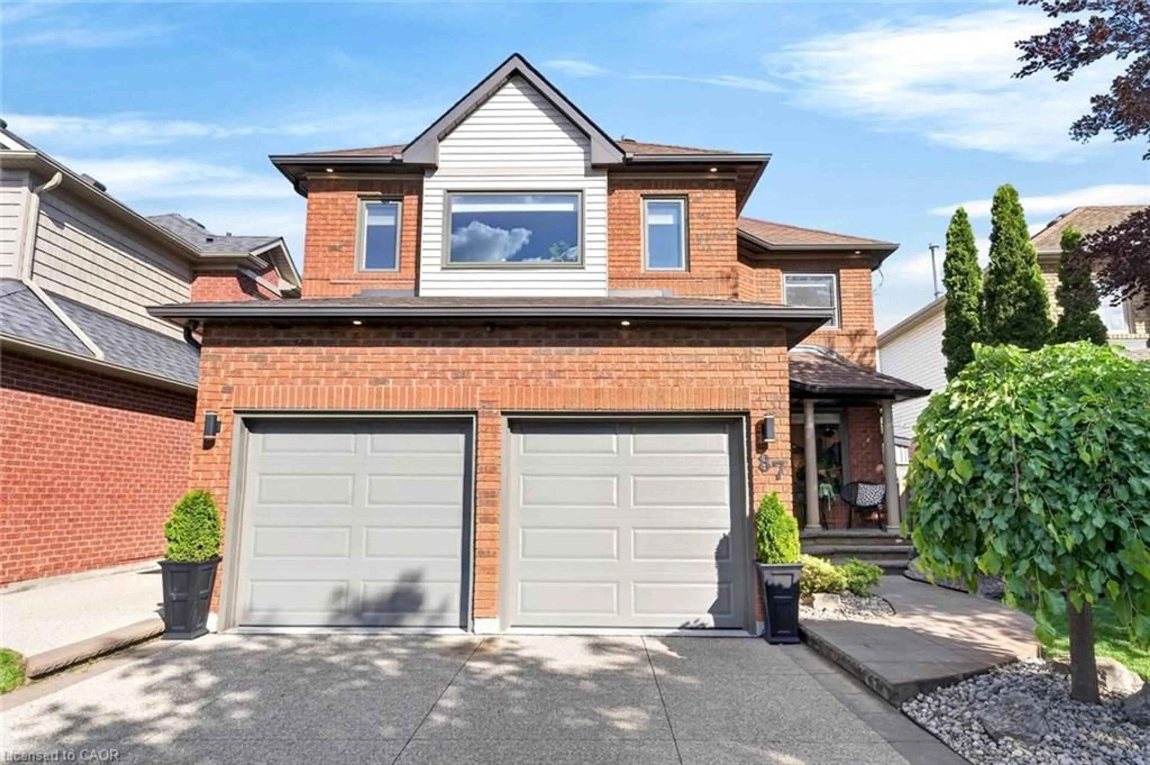 Home with brick exterior material, street for 87 Chatsworth Cres, Waterdown Ontario L8B 0N7