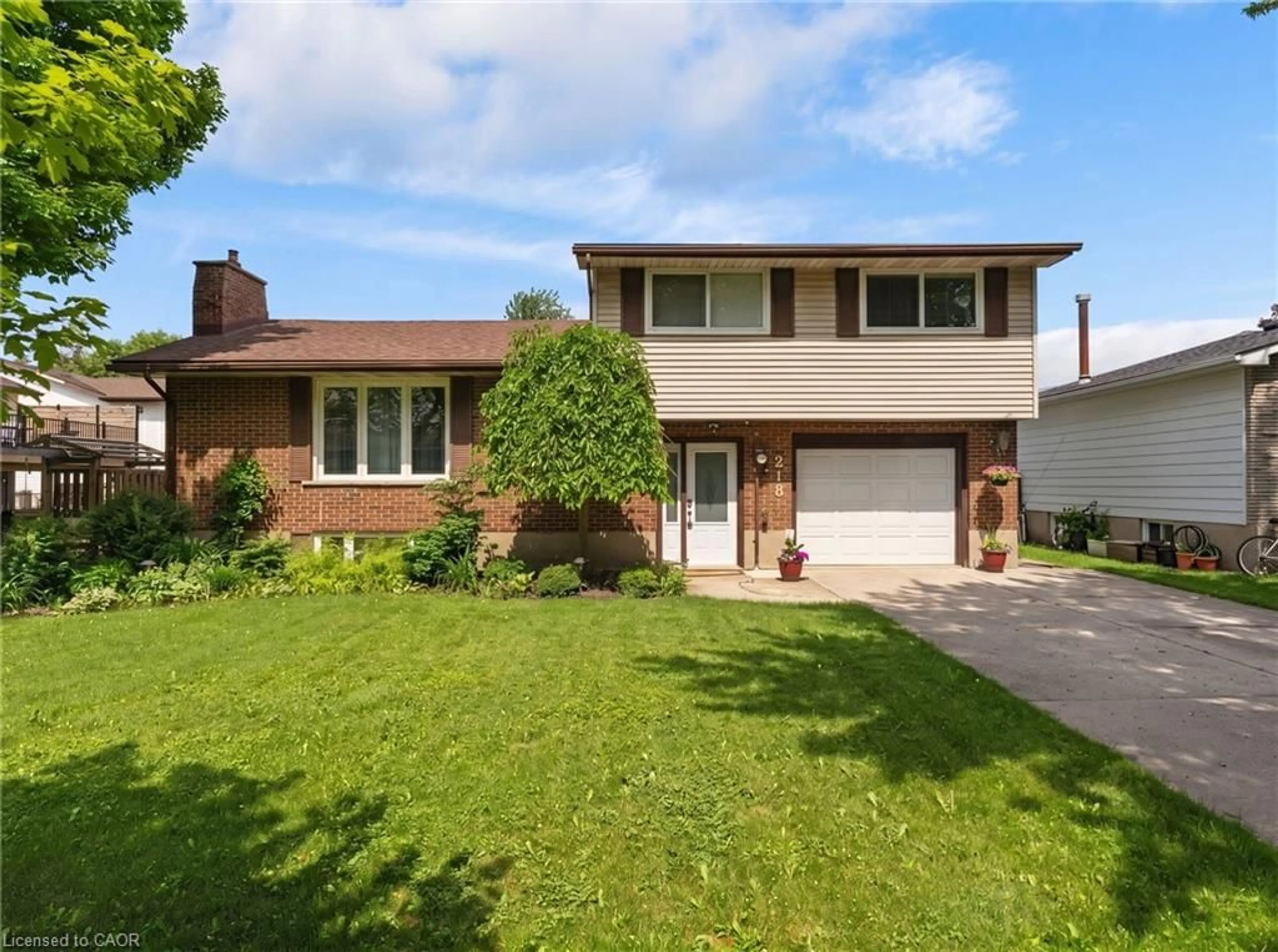 Home with brick exterior material, street for 218 Arris Cres, Mitchell Ontario N0K 1N0