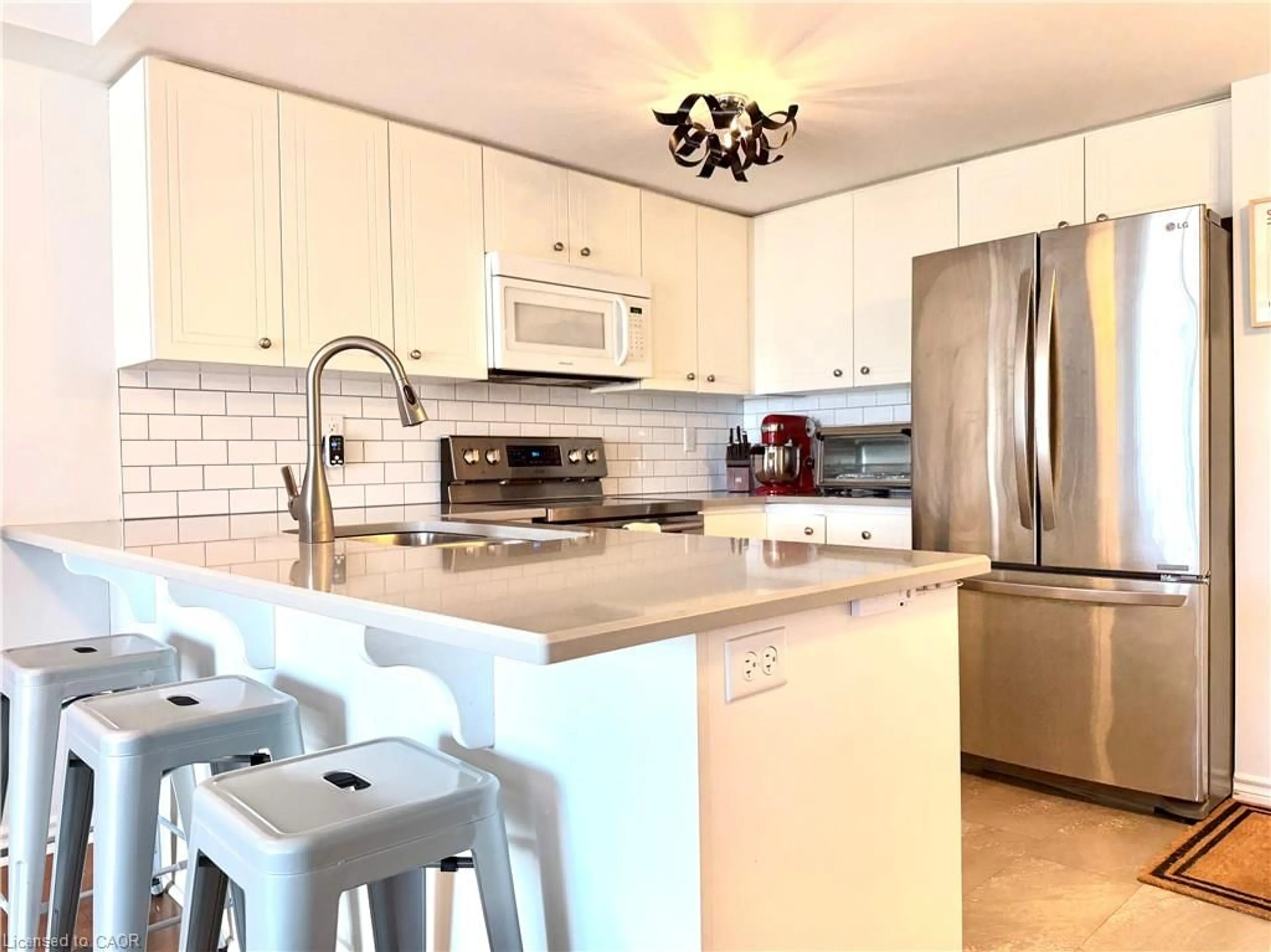 Open concept kitchen, ceramic/tile floor for 19 Waterford Dr #401, Guelph Ontario N1L 0G8