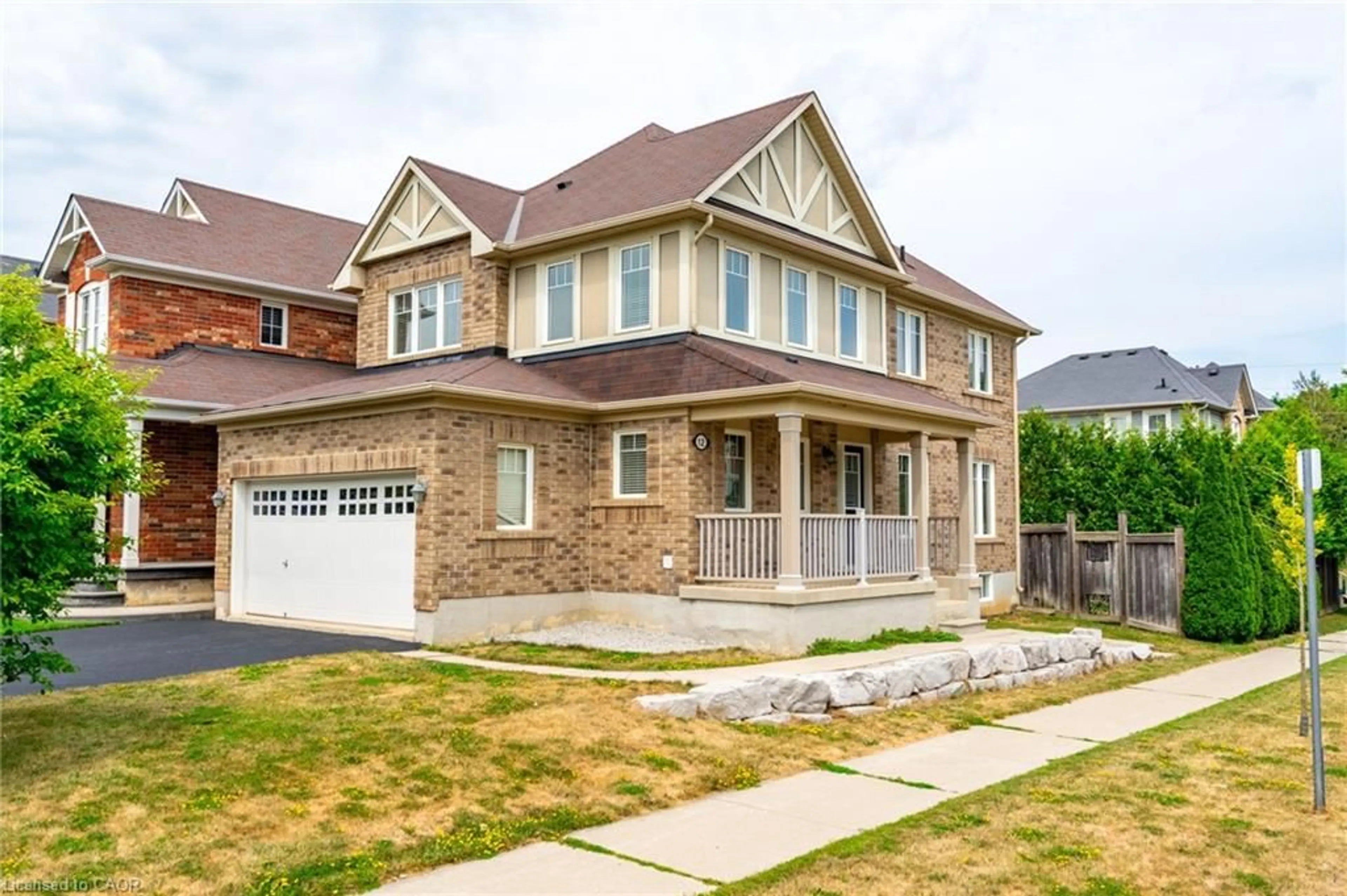 Home with brick exterior material, street for 12 Emick Dr, Ancaster Ontario L9K 0C8