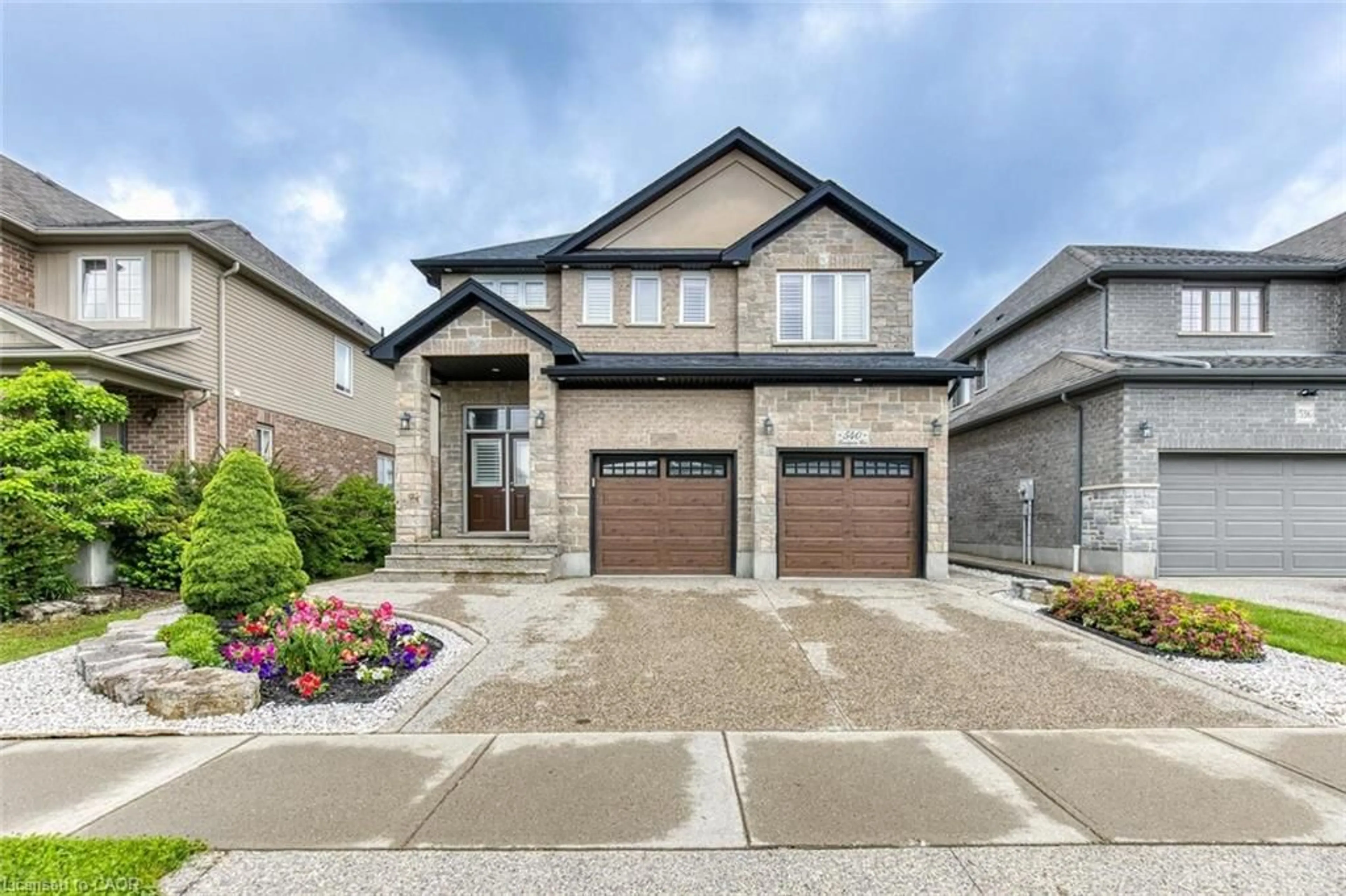 Home with brick exterior material, street for 540 Landgren Crt, Kitchener Ontario N2A 4J7