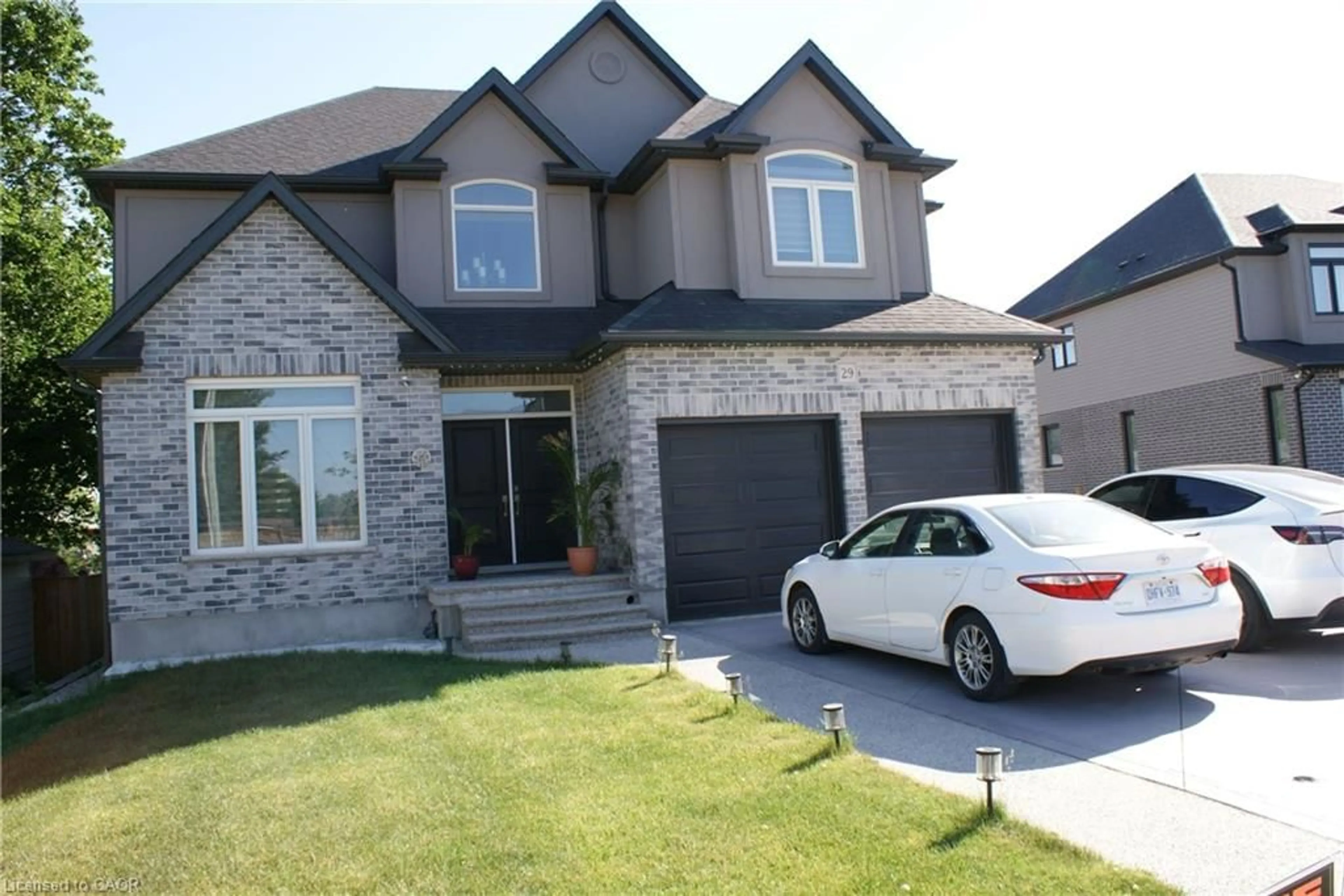 Home with brick exterior material, street for 29 Burton St, Innerkip Ontario N0J 1M0