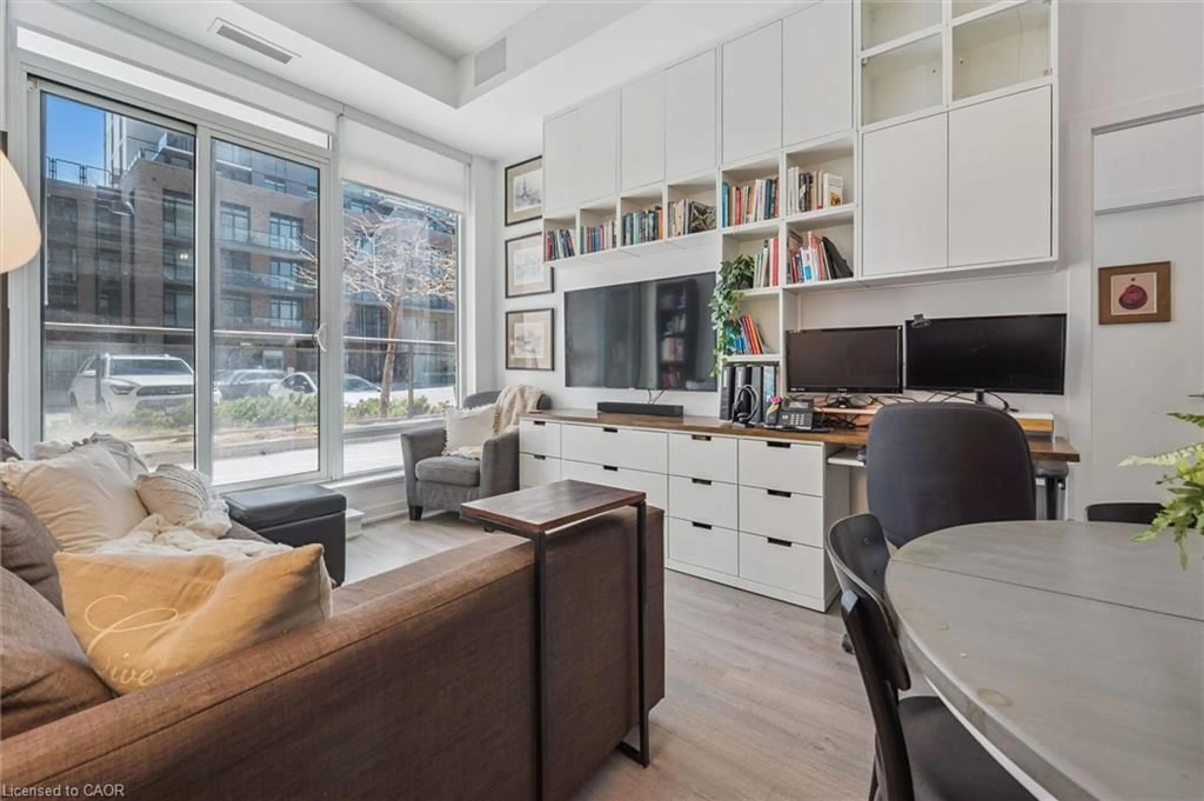Open concept kitchen, wood/laminate floor for 85 Duke St #103, Kitchener Ontario N2H 0B7