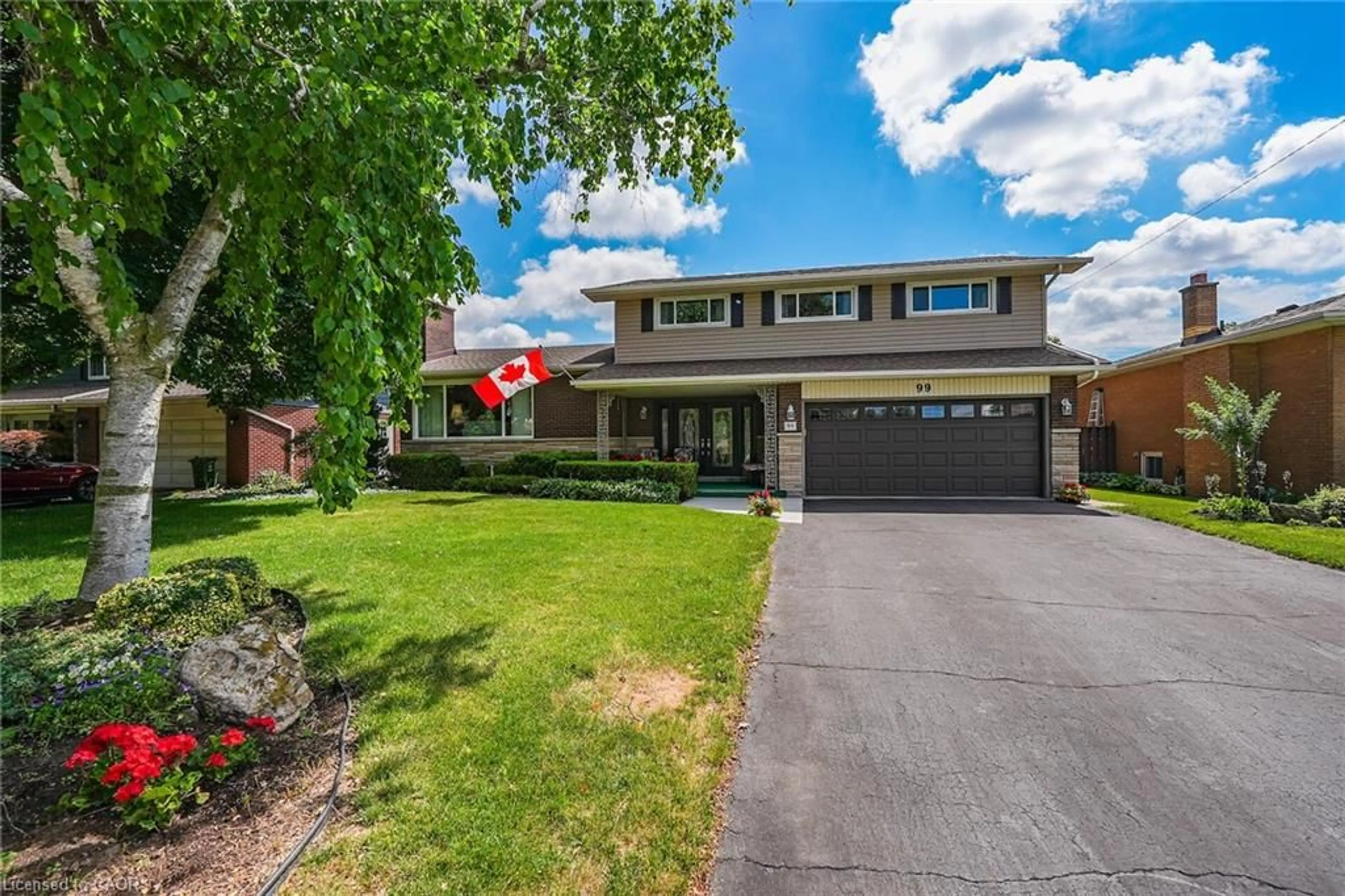 Home with brick exterior material, street for 99 Elmhurst Dr, Hamilton Ontario L8T 1C5