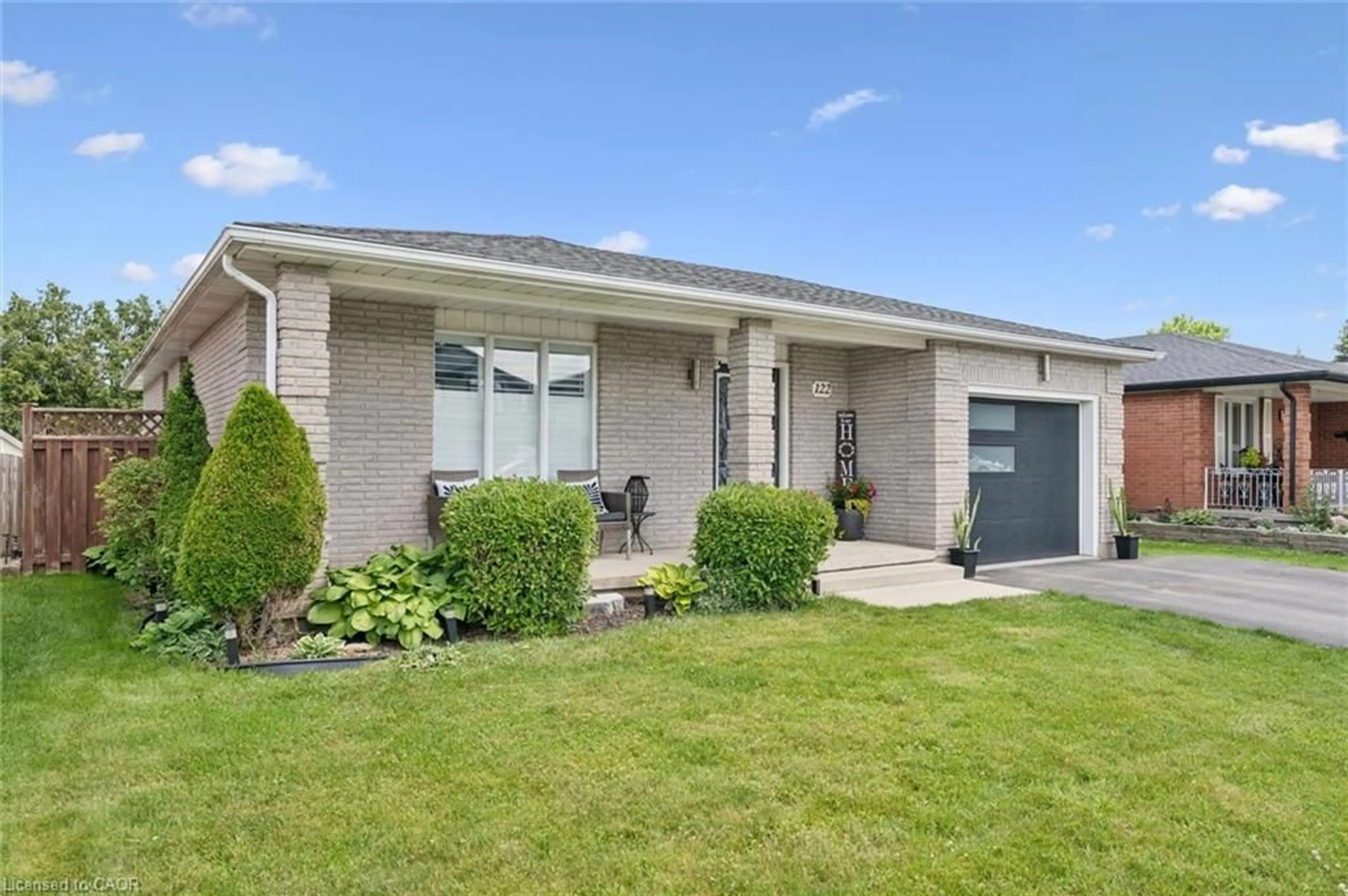 Home with brick exterior material, street for 122 Lisbon Pines Dr, Cambridge Ontario N1R 8C7