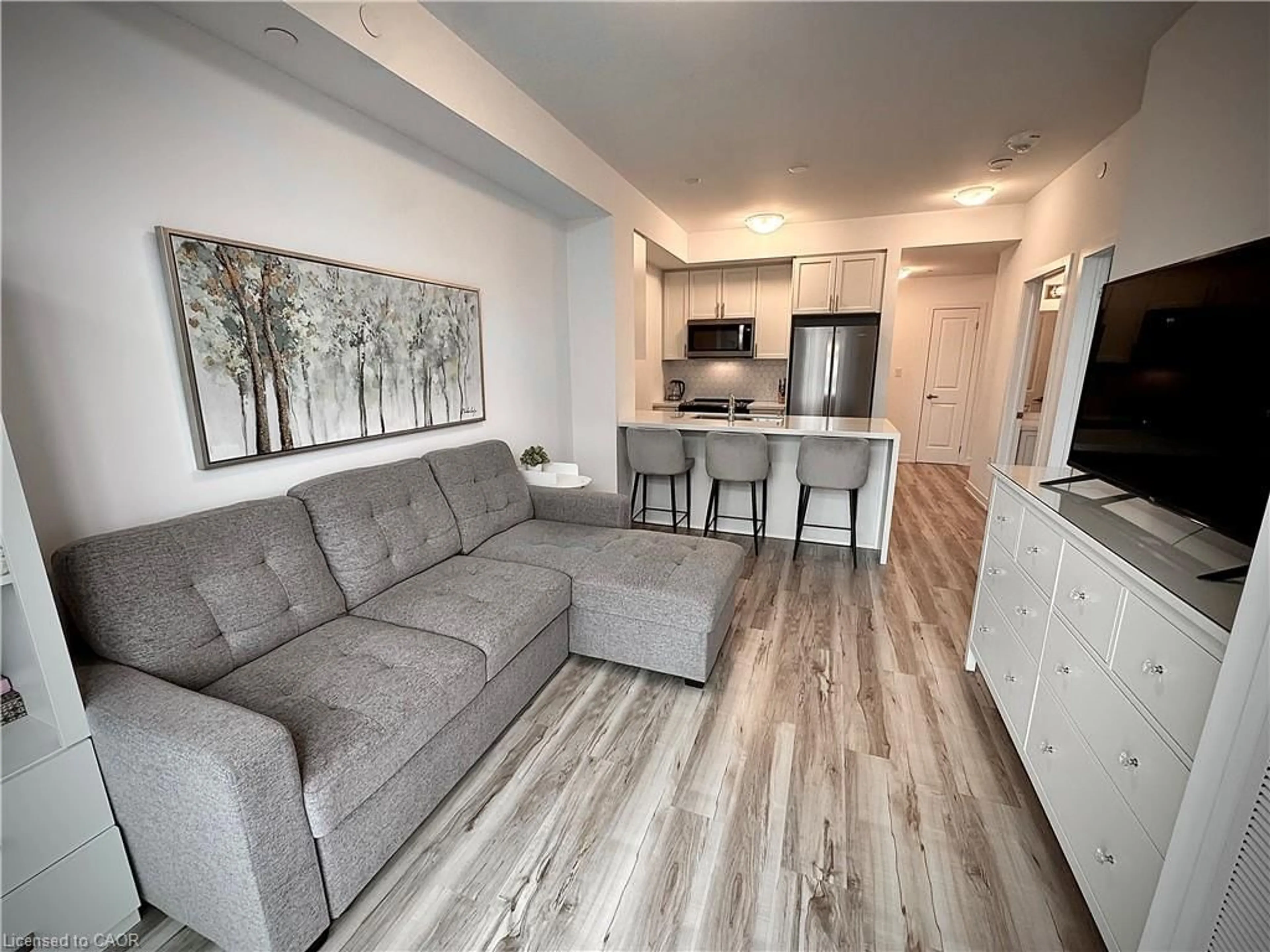 Living room with furniture, unknown for 460 Dundas St #709, Waterdown Ontario L8B 2A5