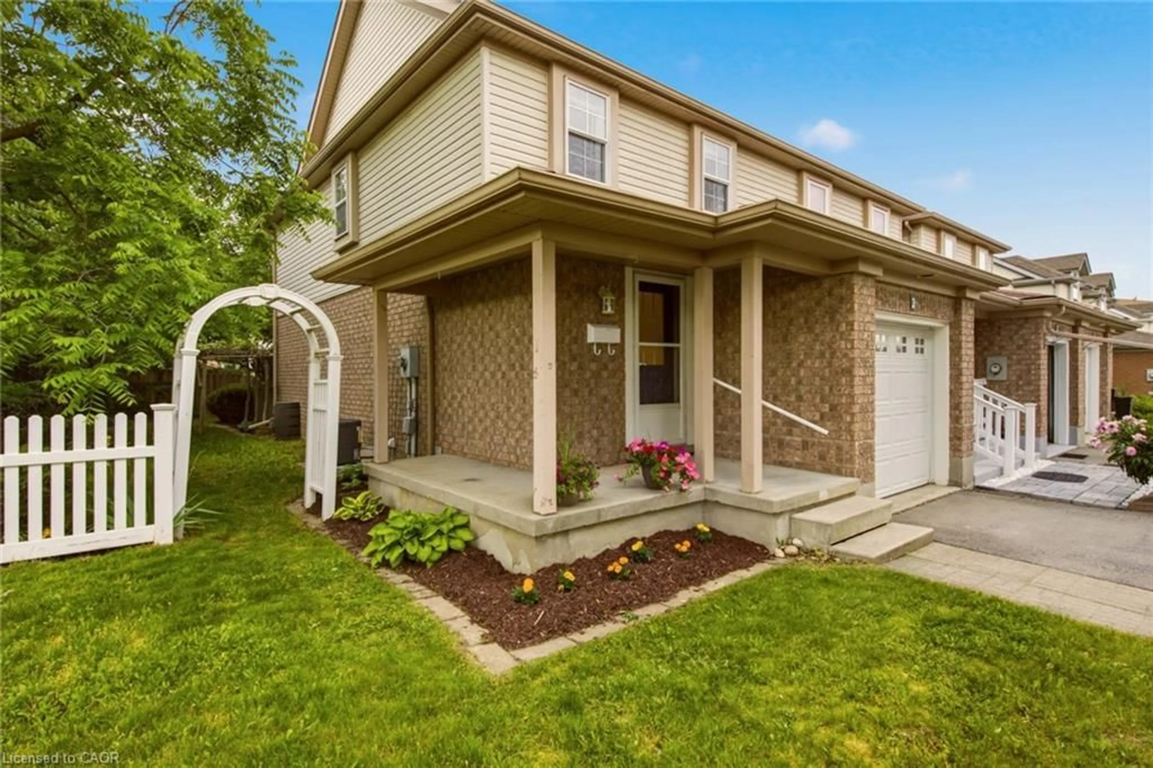 Home with brick exterior material, street for 2 Ireland Pl, Guelph Ontario N1E 7C2