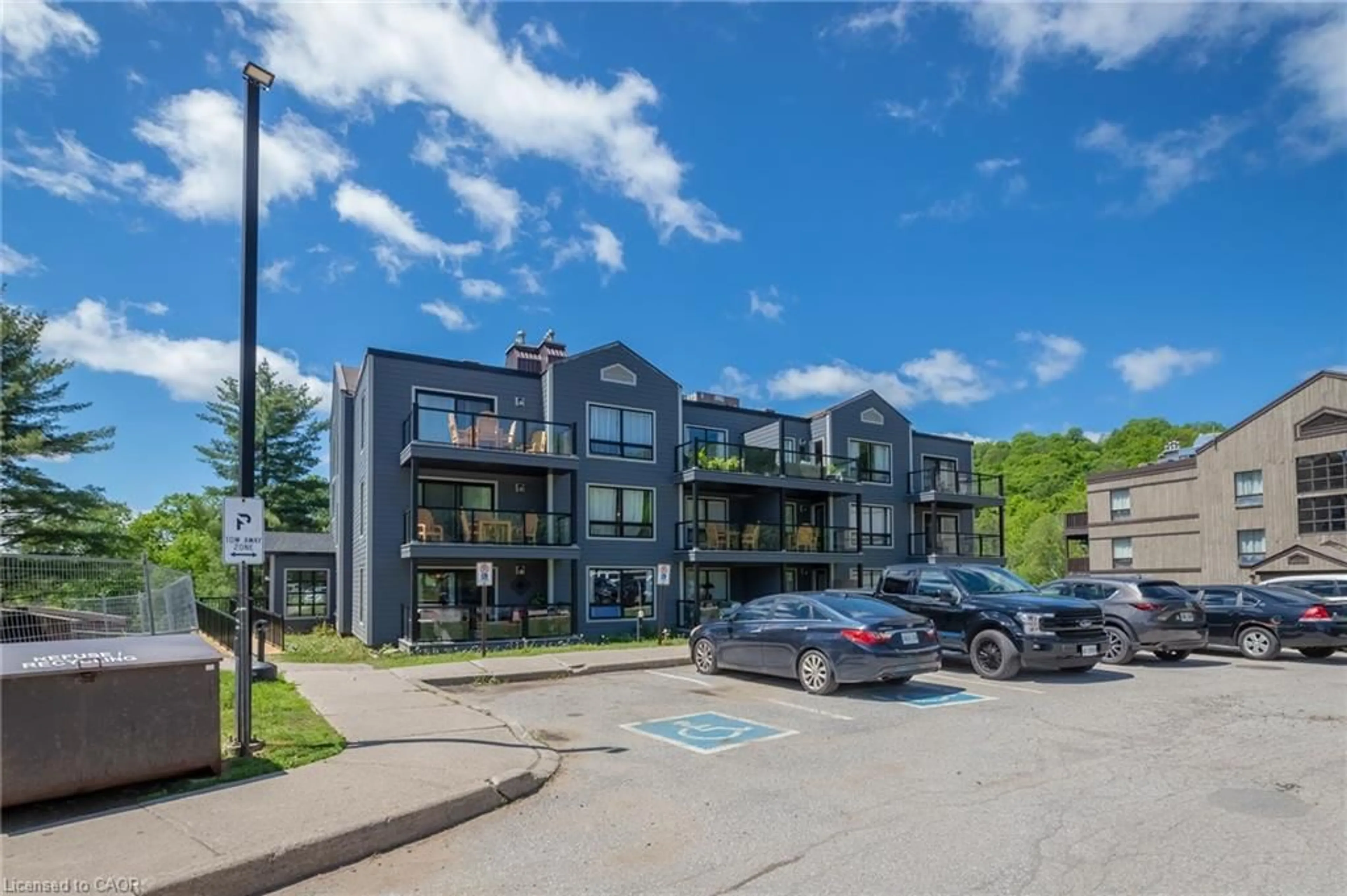 A pic from outside/outdoor area/front of a property/back of a property/a pic from drone, unknown for 1235 Deerhurst Dr #305, Huntsville Ontario P1H 2E8
