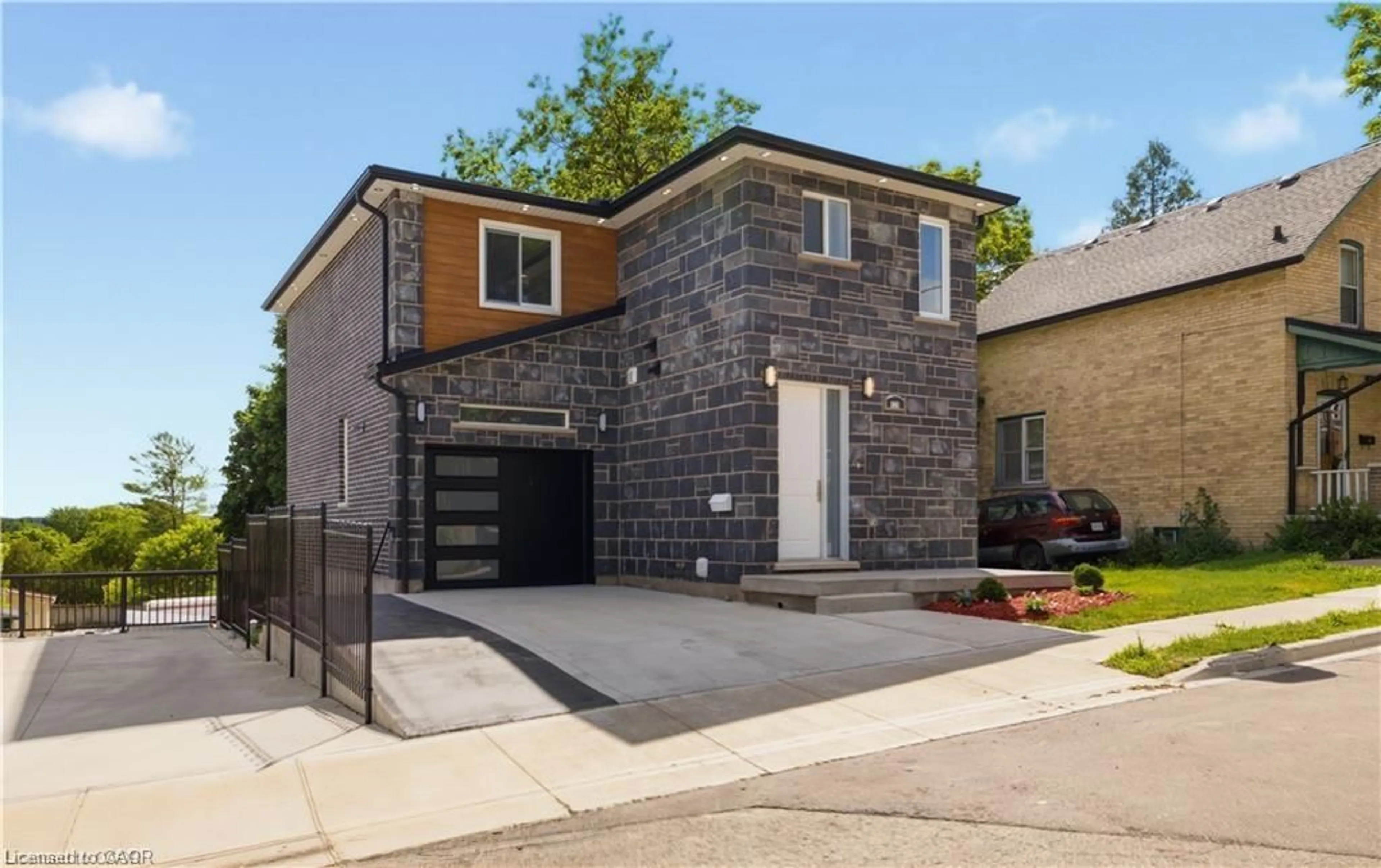 Home with brick exterior material, street for 129 St George St, Kitchener Ontario N2G 2T2
