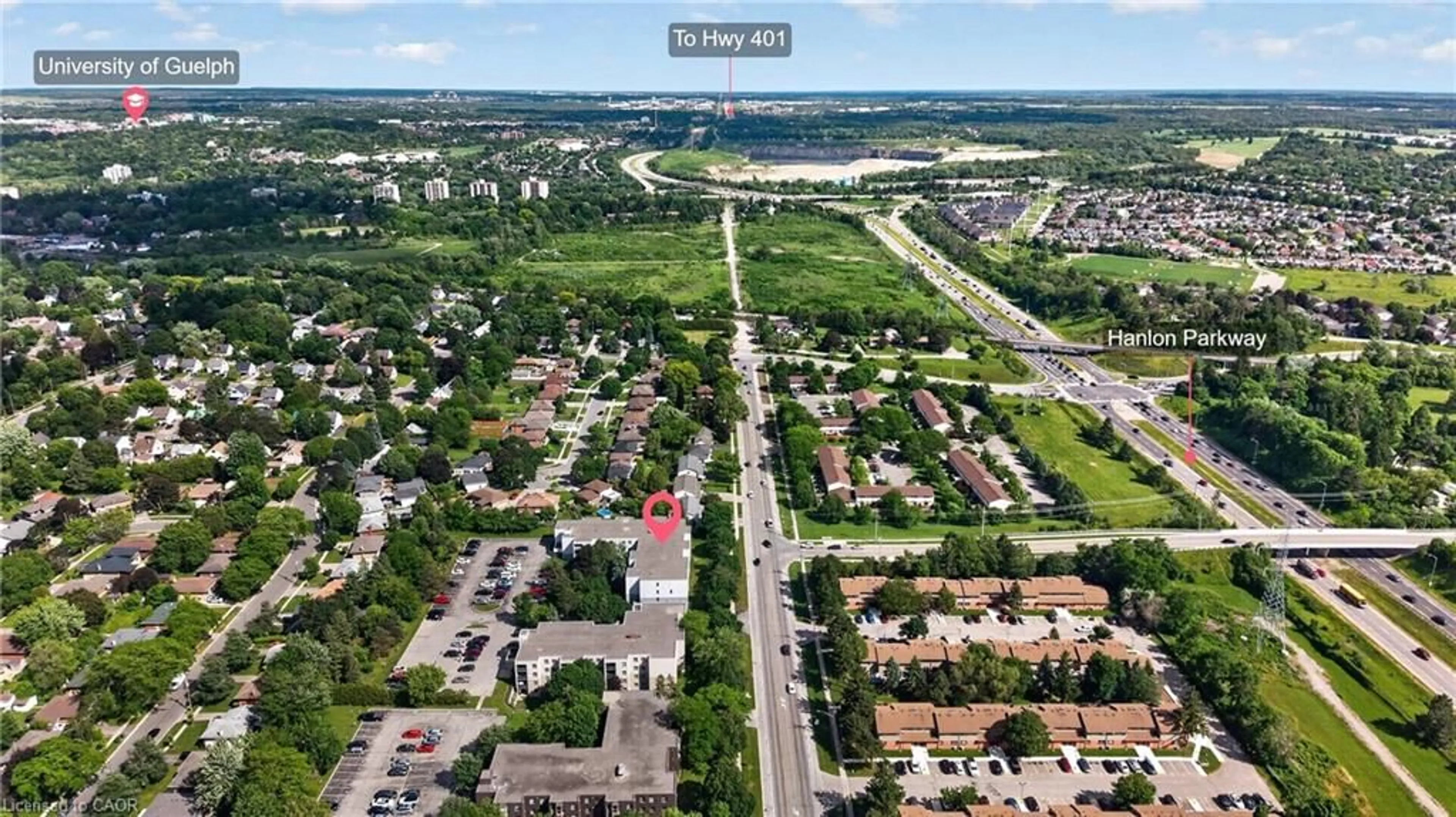 A pic from outside/outdoor area/front of a property/back of a property/a pic from drone, street for 65 Silvercreek Pky #401, Guelph Ontario N1H 7R9